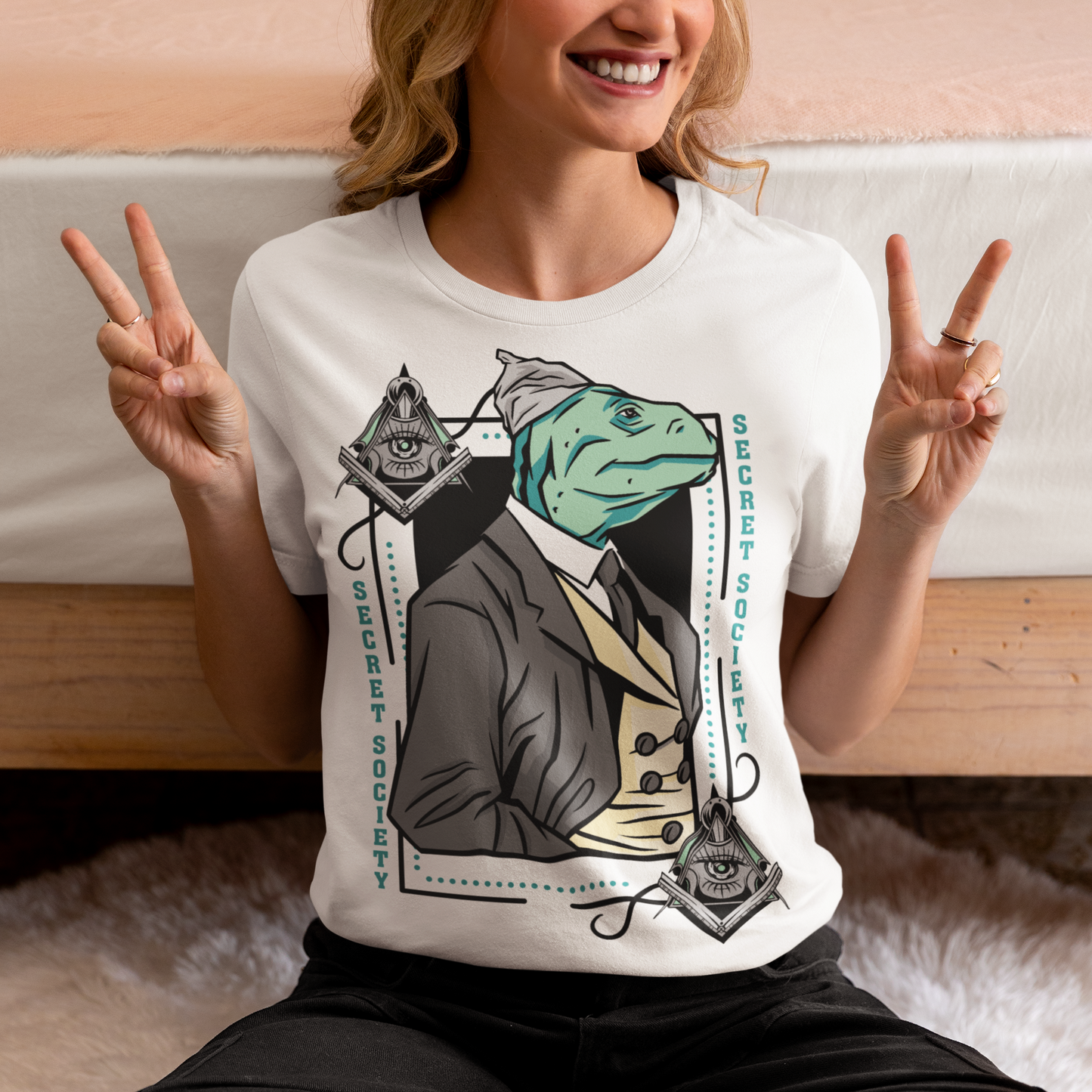 Introducing the enigmatic and captivating "Lizard Illuminati" T-shirt, a bold and eccentric garment that seamlessly blends conspiracy theories with reptilian sophistication. This one-of-a-kind tee is not just a piece of clothing; it's a statement, a conversation starter, and a whimsical nod to the mysteries that lurk in the shadows.