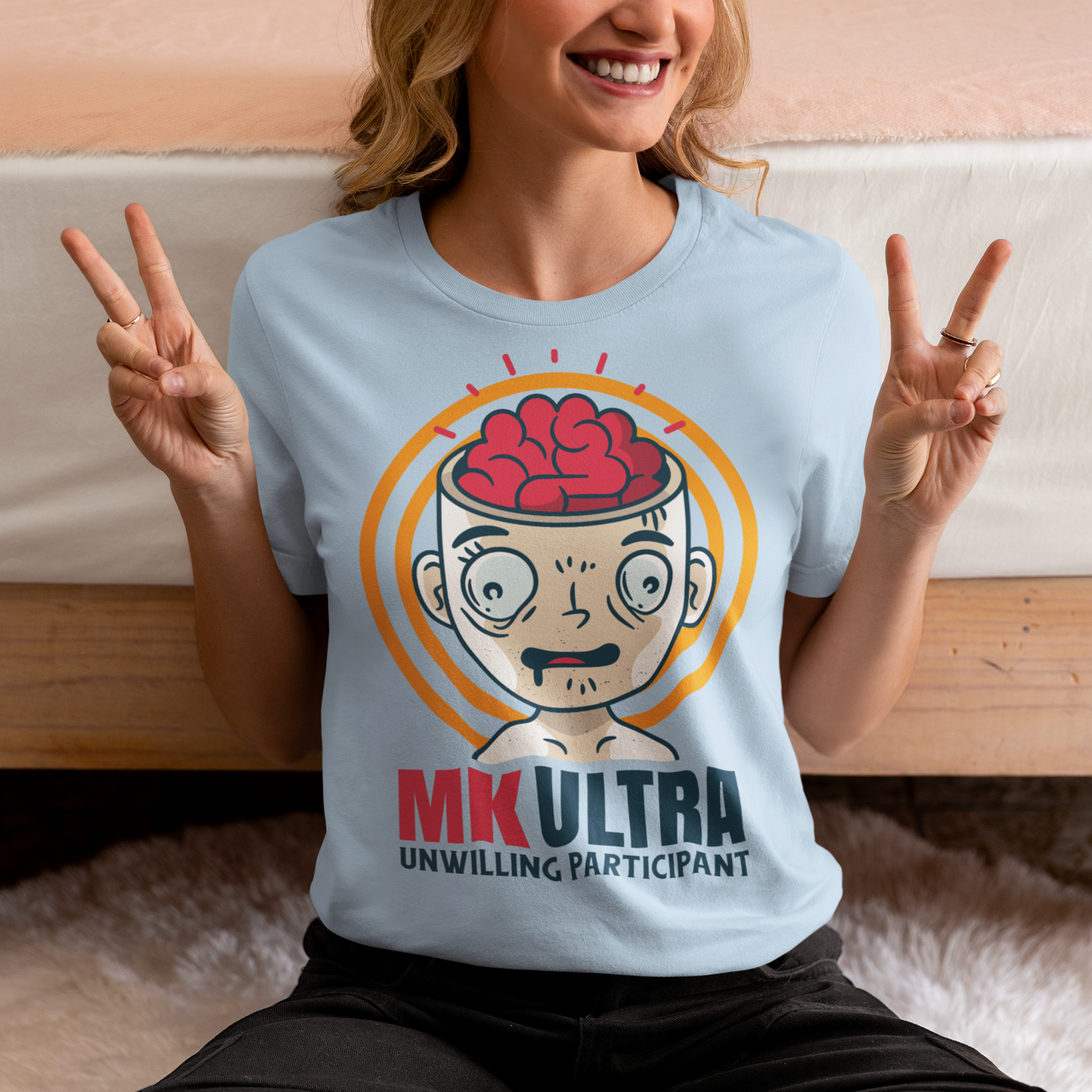 Unveil the enigmatic with our 'MK ULTRA UNWILLING PARTICIPANT' t-shirt! This design boldly features an intriguing graphic of a person with a visible brain, symbolizing the unseen complexities within. Beneath this thought-provoking image lies the impactful message, 'MK ULTRA UNWILLING PARTICIPANT,' a reminder of historical complexities and the exploration of human consciousness.