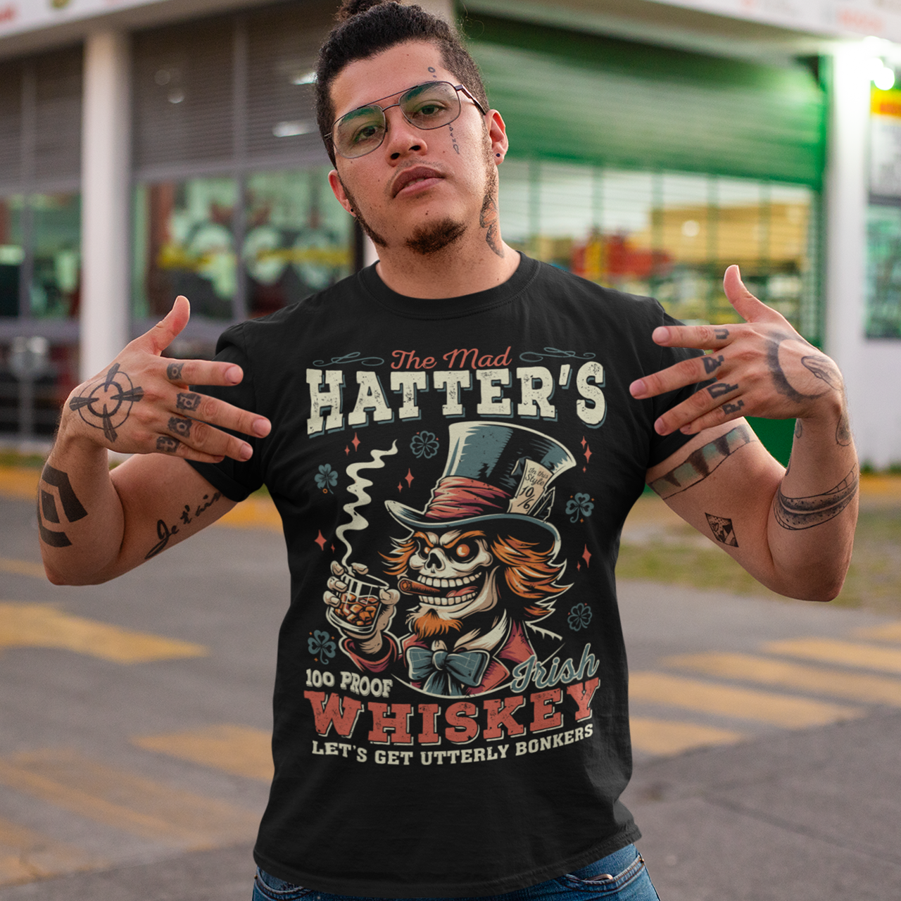 Get ready to add a touch of whimsical madness to your wardrobe with "The Mad Hatter Irish Whiskey" t-shirt! Inspired by the iconic character from Lewis Carroll's "Alice's Adventures in Wonderland," this shirt features a vibrant illustration of the Mad Hatter, complete with his signature top hat and mischievous grin. With intricate detailing and vivid colors, it captures the essence of Wonderland's eccentric tea party host.
