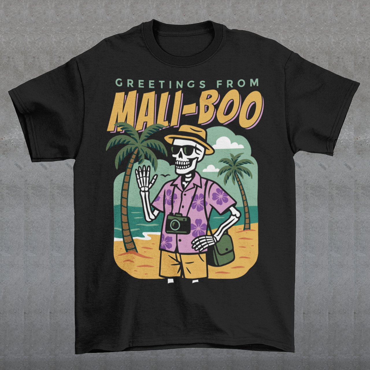 Bring spooky vibes to the sunshine with our “Greetings from Mali-Boo” Skeleton Tee. Featuring a laid-back skeleton kicking back on the beach, this shirt blends Halloween humor with tropical holiday fun. Perfect for anyone who loves a good pun, it’s a playful mash-up of palm trees, sandy shores, and ghostly charm. Lightweight, soft, and eye-catching, this tee is your go-to for summer parties, Halloween hangouts, or just showing off your wicked sense of humor.