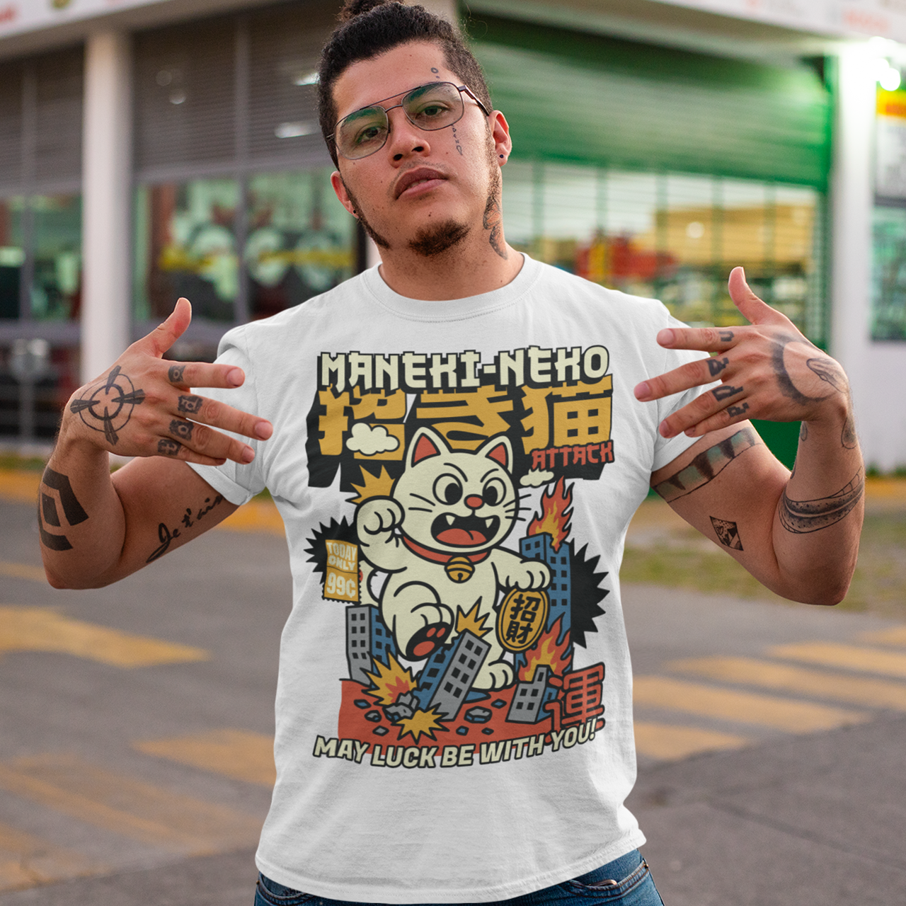 Unleash feline fury with this eye-catching "MANEKI-NEKO ATTACK" t-shirt! Featuring a giant, rampaging Lucky Cat towering over a city skyline, this design puts a wild twist on the traditional symbol of good fortune. With one paw raised and destruction in its wake, the Maneki-Neko trades charm for chaos—smashing buildings while still sporting that iconic golden bell. Bold, stylized lettering screams "MANEKI-NEKO ATTACK" across the top, giving the shirt a retro kaiju-meets-pop-art vibe. Perfect for fans of Jap