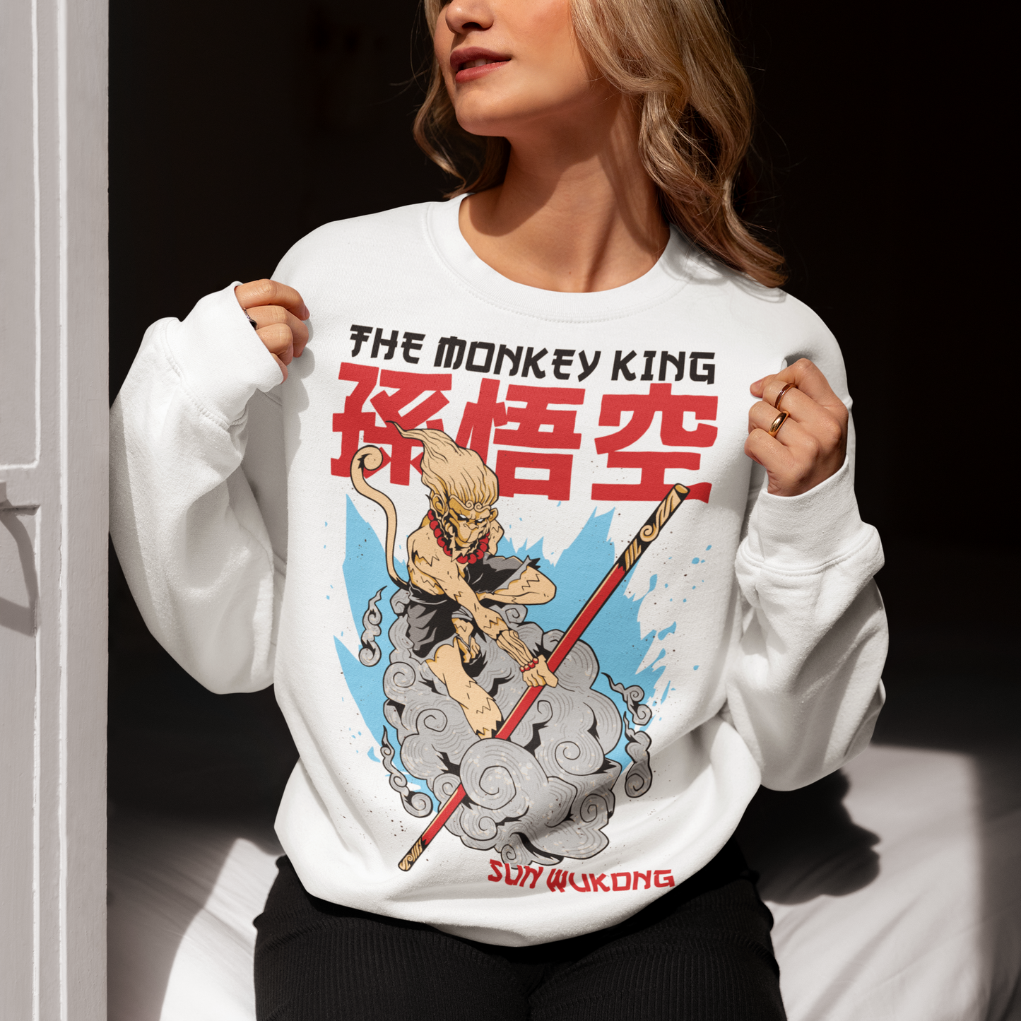 Unleash the spirit of rebellion and wisdom with this bold Sun Wukong (The Monkey King) sweatshirt. Inspired by the legendary trickster from Journey to the West, the design captures his fearless energy, divine mischief, and unstoppable strength. Featuring detailed artwork of Wukong wielding his iconic Ruyi Jingu Bang staff, this tee embodies courage, cleverness, and unbreakable will.