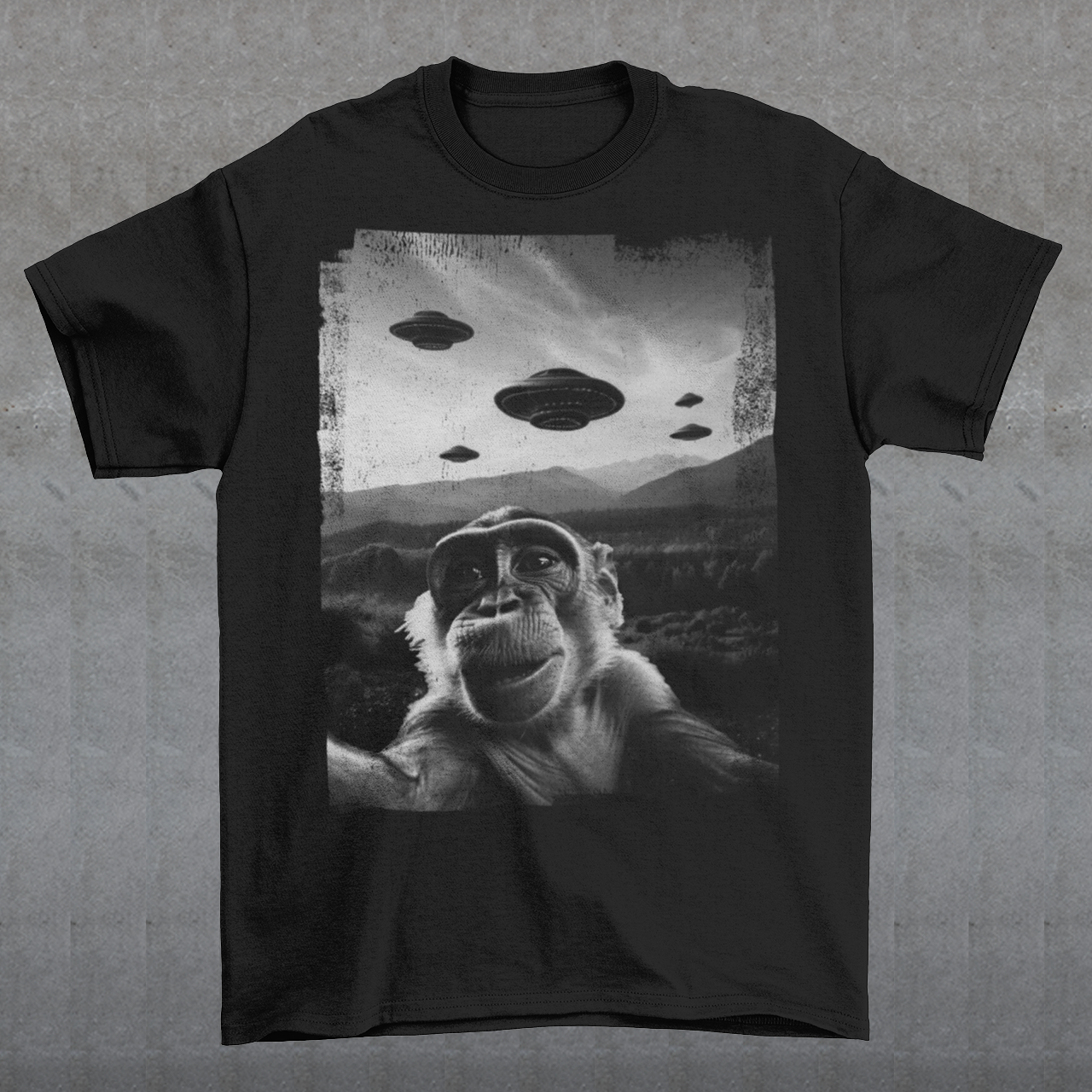 Introducing our whimsical and out-of-this-world "Cosmic Monkey Selfie" t-shirt! Prepare to embark on a journey through the cosmos with our cheeky primate friend as your guide. Picture this: a mischievous monkey capturing the ultimate selfie moment with a backdrop that's truly out of this world. Centered on the front of the shirt, our lovable monkey strikes a pose, grinning from ear to ear as it snaps a selfie with a group of UFOs hovering in the distant sky.