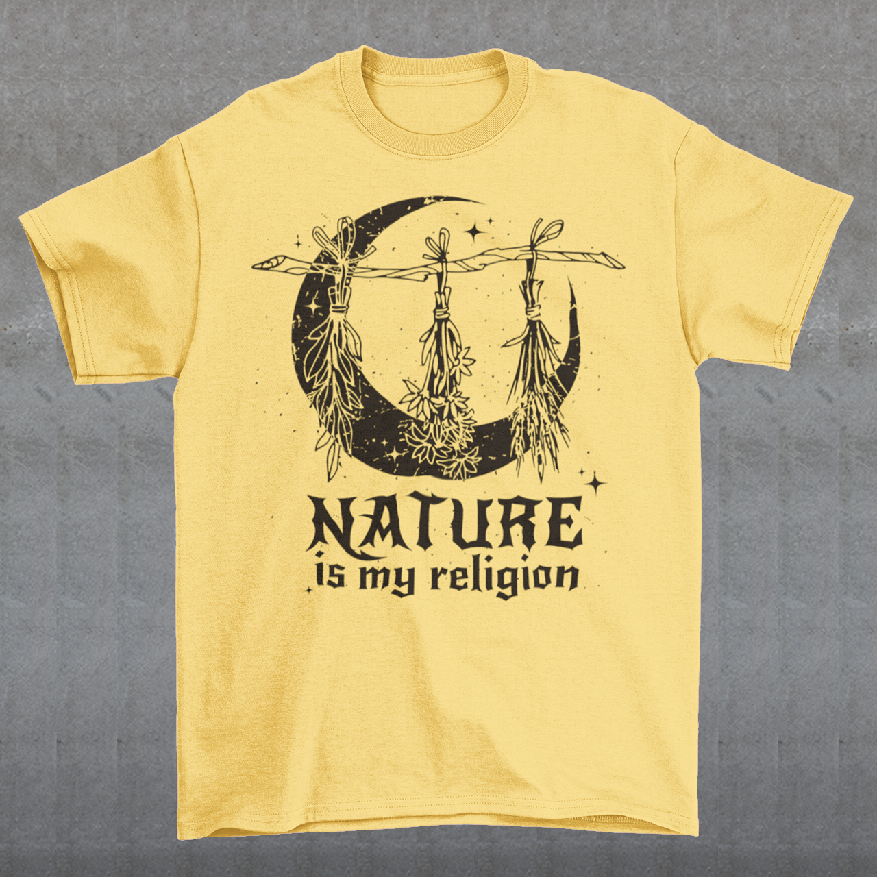 This t-shirt features a stunning and eye-catching design that is sure to grab attention wherever you go. The front of the shirt boldly displays the phrase "Nature is my religion" in bold, striking lettering. The message is a powerful statement that reflects a deep connection and reverence for the natural world. The moon, depicted in intricate detail, adds an extra layer of symbolism to the design.