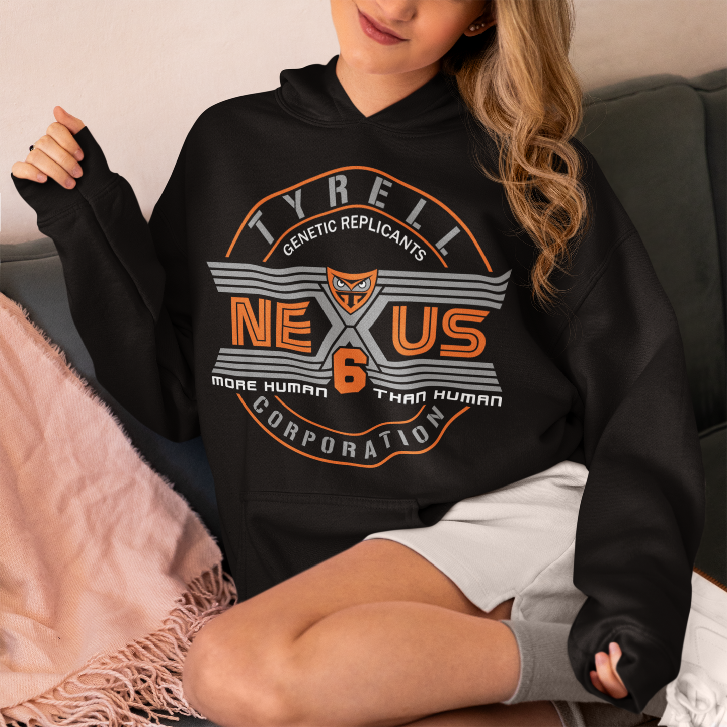 Step into the dystopian future with this sleek Nexus Tyrell Corporation hoodie, inspired by the iconic Blade Runner universe. Featuring the legendary Tyrell logo and bold "Nexus" branding, this shirt pays homage to the megacorp behind the world's most advanced replicants. This shirt is perfect for fans of cyberpunk, sci-fi, or anyone drawn to the blurred lines between human and machine.