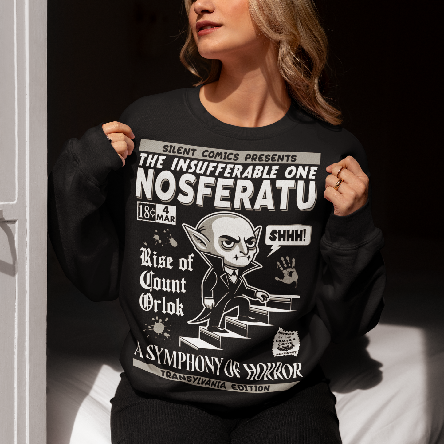 Black sweatshirt of a comic book cover of Nosferatu. A symphony of horror.