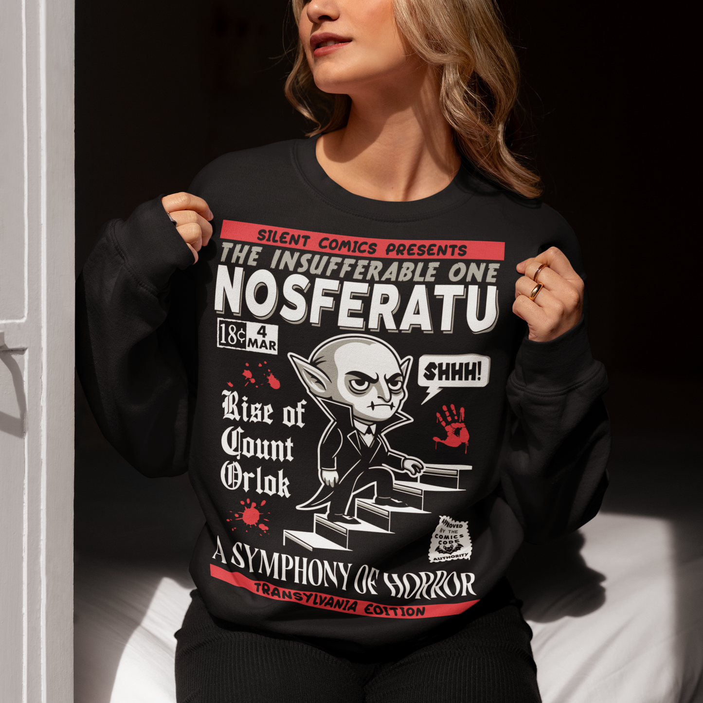 Black sweatshirt of a comic book cover of Nosferatu. A symphony of horror.