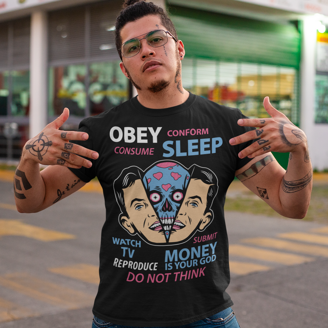 Introducing our bold and thought-provoking t-shirt design, featuring an extraterrestrial creature removing a human face with the words "Obey, Submit, Conform, Consume, Money is your God" boldly emblazoned across the front. This striking design serves as a powerful reminder of the dangers of blindly following societal norms and expectations, and the all-consuming nature of money and consumerism in our modern world.