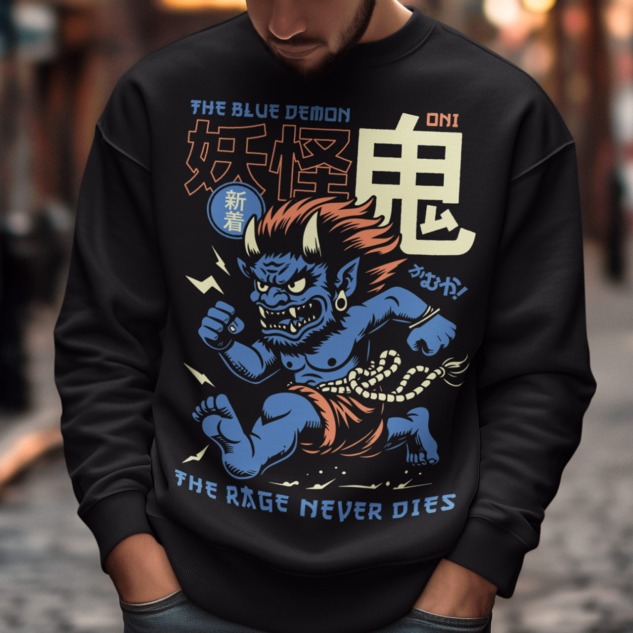Bold, fierce, and unstoppable — this dynamic sweatshirt features a powerful Japanese Oni mid-sprint, eyes blazing and muscles tense with fury. Above the image, bold text declares "THE BLUE DEMON", while below, a chilling reminder reads: "THE RAGE NEVER DIES". This shirt captures the raw energy and mythic wrath of the Oni spirit — perfect for those who embrace intensity and never back down.