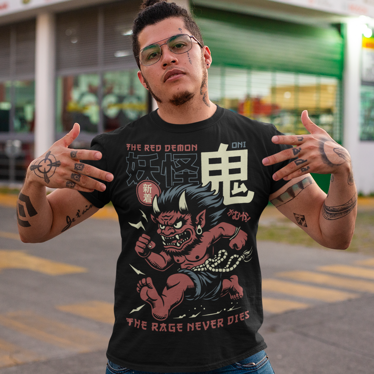 Bold, fierce, and unstoppable — this dynamic tee features a powerful Japanese Oni mid-sprint, eyes blazing and muscles tense with fury. Above the image, bold text declares "THE RED DEMON", while below, a chilling reminder reads: "THE RAGE NEVER DIES". This shirt captures the raw energy and mythic wrath of the Oni spirit — perfect for those who embrace intensity and never back down.