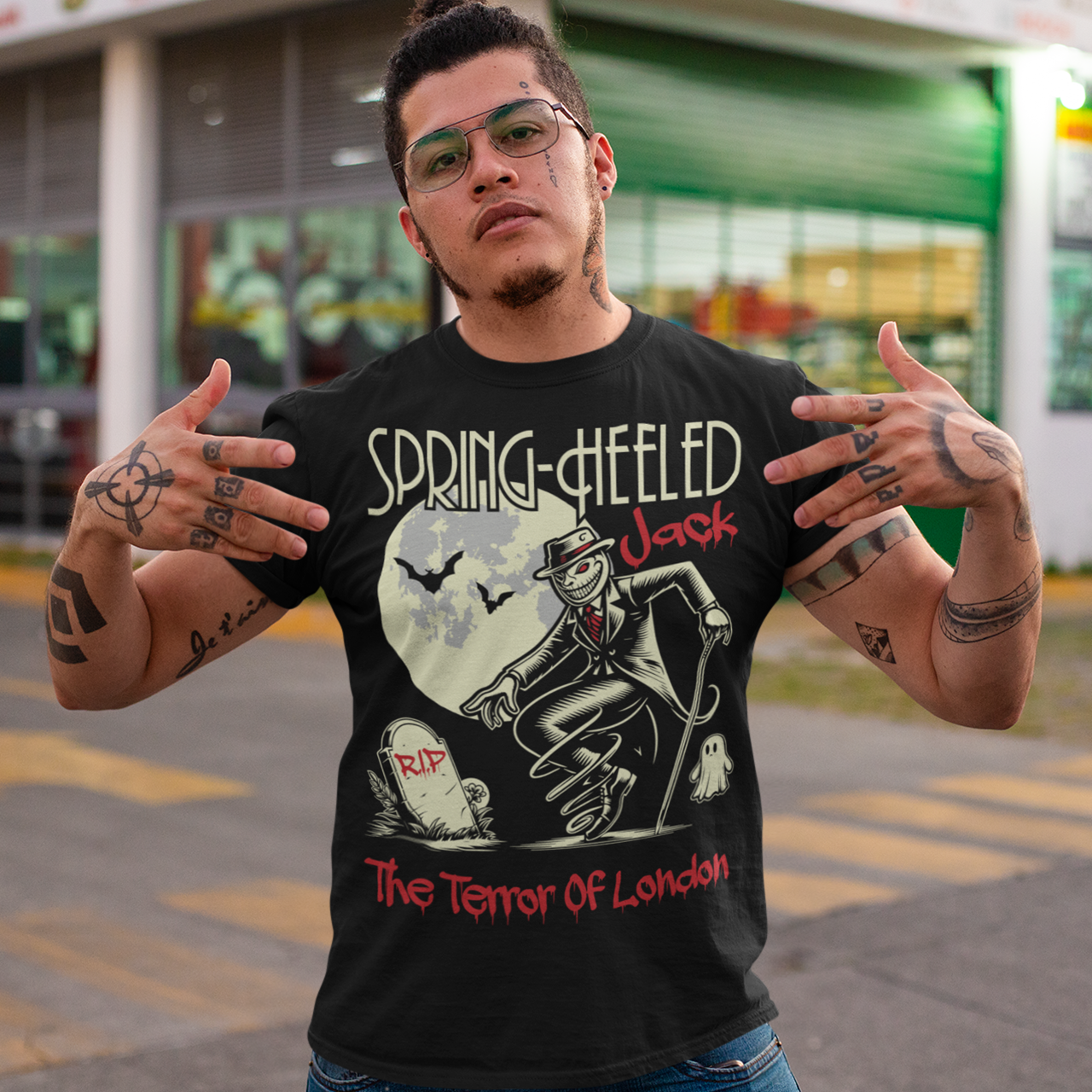 At the center of this striking t-shirt design stands Spring-heeled Jack, the enigmatic figure of Victorian urban legend. Rendered in bold lines and vibrant colors, Spring-heeled Jack exudes an air of mystery and menace. His elongated figure seems to leap from the fabric, his eyes gleaming with an otherworldly intensity.