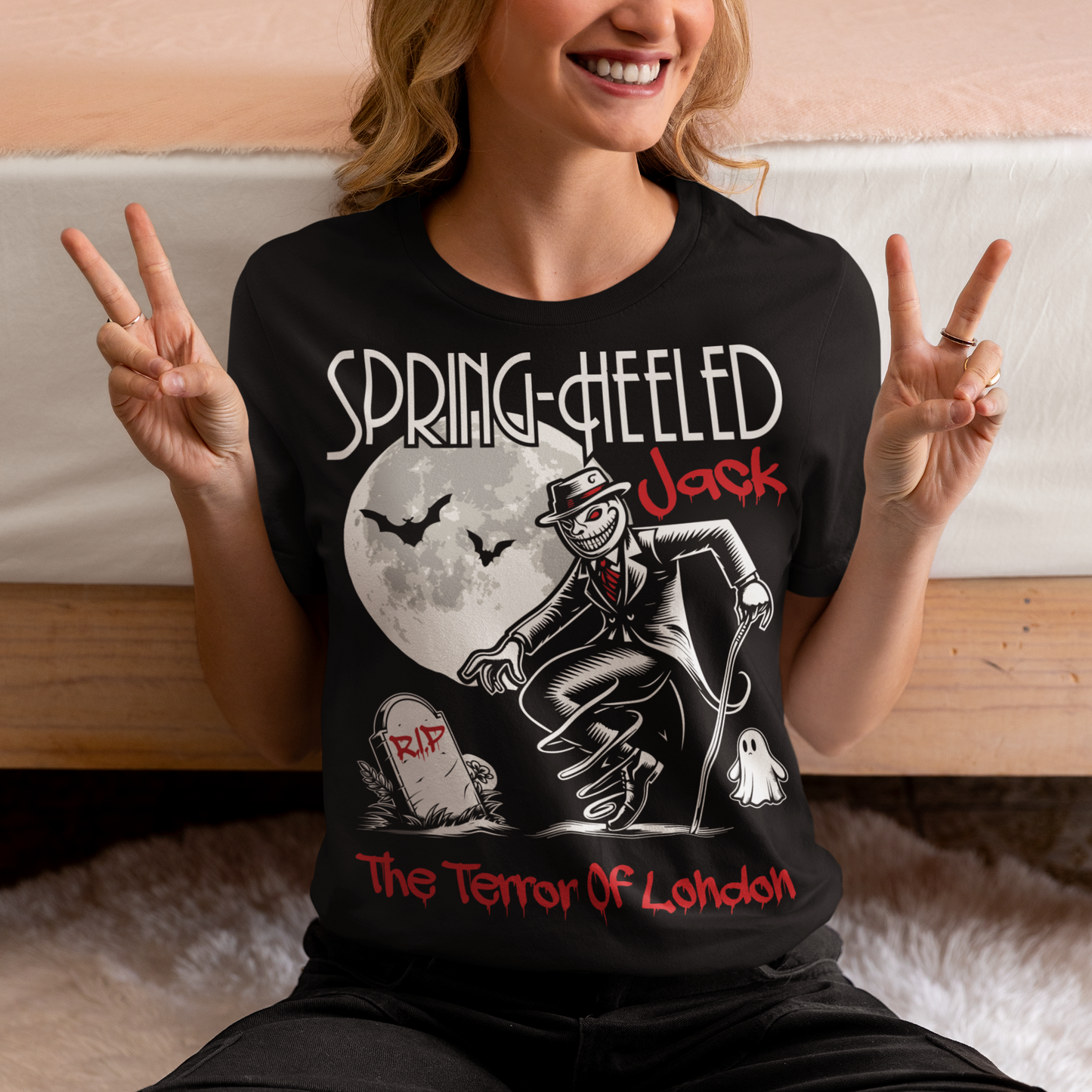 At the center of this striking t-shirt design stands Spring-heeled Jack, the enigmatic figure of Victorian urban legend. Rendered in bold lines and vibrant colors, Spring-heeled Jack exudes an air of mystery and menace. His elongated figure seems to leap from the fabric, his eyes gleaming with an otherworldly intensity.