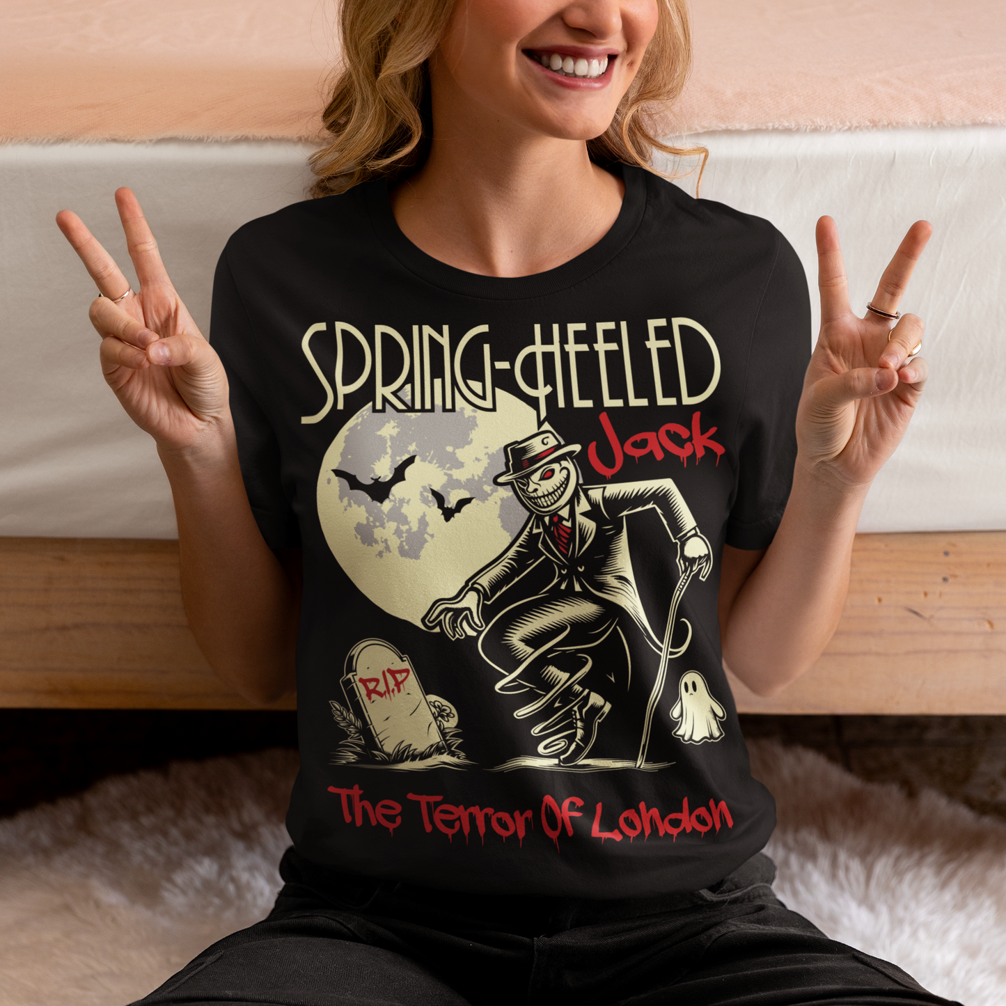 At the center of this striking t-shirt design stands Spring-heeled Jack, the enigmatic figure of Victorian urban legend. Rendered in bold lines and vibrant colors, Spring-heeled Jack exudes an air of mystery and menace. His elongated figure seems to leap from the fabric, his eyes gleaming with an otherworldly intensity.