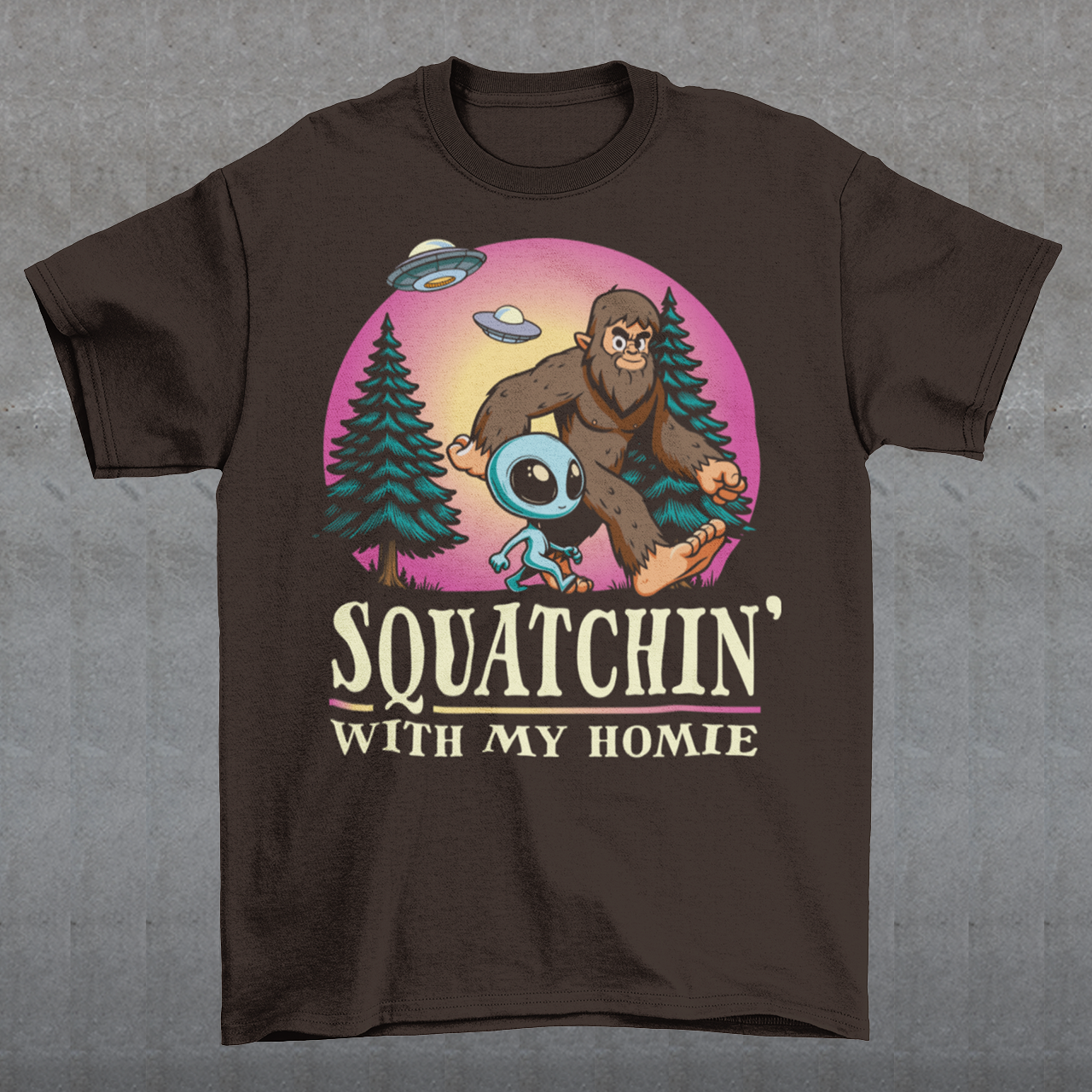 Embark on an otherworldly adventure with our Bigfoot an Alien hiking design, where the mysterious meets the adorable! This captivating scene depicts Bigfoot and his trusty Alien companion trekking through the dense forest, surrounded by towering trees and vibrant foliage. Above them, the sky is alight with the presence of UFOs, adding an element of cosmic wonder to their journey.