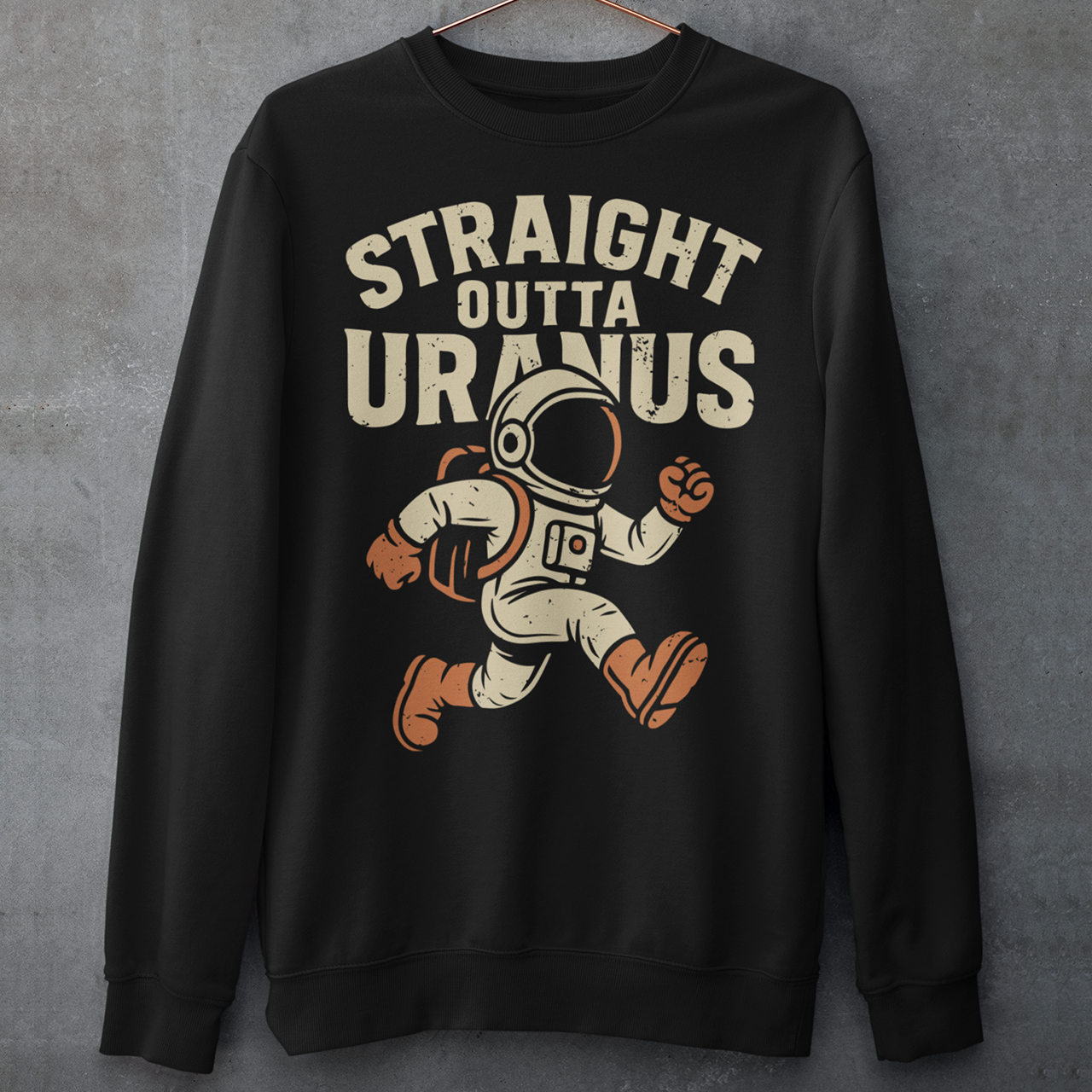 Make the galaxy laugh with this bold and hilarious sweatshirt! Featuring a cartoon-style spaceman floating in the cosmos, this shirt makes a cosmic statement with the cheeky slogan "STRAIGHT OUTTA URANUS" printed above. Perfect for space nerds, pun-lovers, and anyone who appreciates a little interstellar humor. Whether you’re stargazing, gaming, or just looking to get a few laughs, this shirt is guaranteed to be a conversation starter.