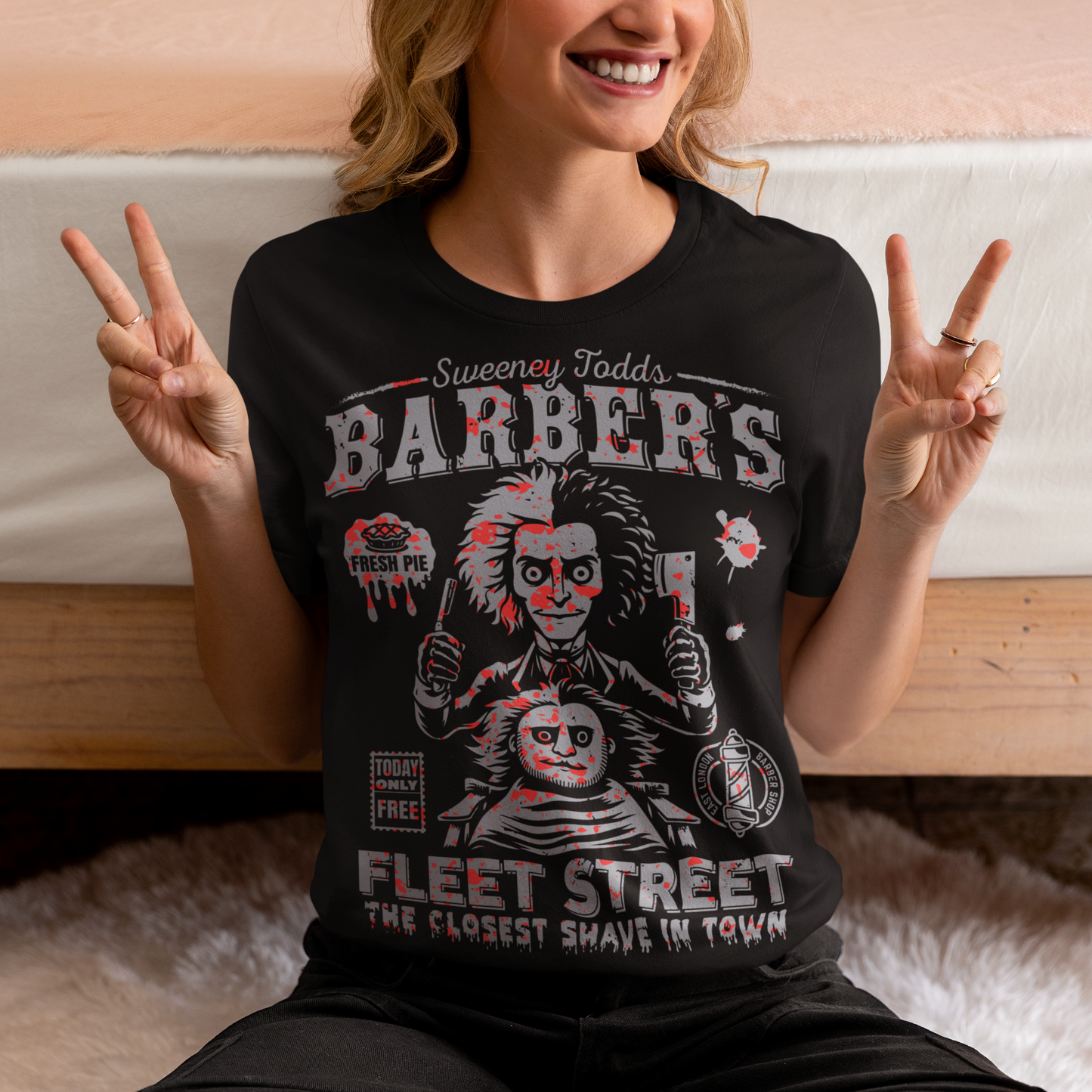 This bold shirt pays tribute to Sweeney Todd’s Barber Shop, the infamous haunt of Fleet Street. The shirt captures the eerie charm of the Demon Barber himself. Perfect for theatre fans, horror enthusiasts, or anyone with a taste for the macabre, this shirt is equal parts stylish and sinister.