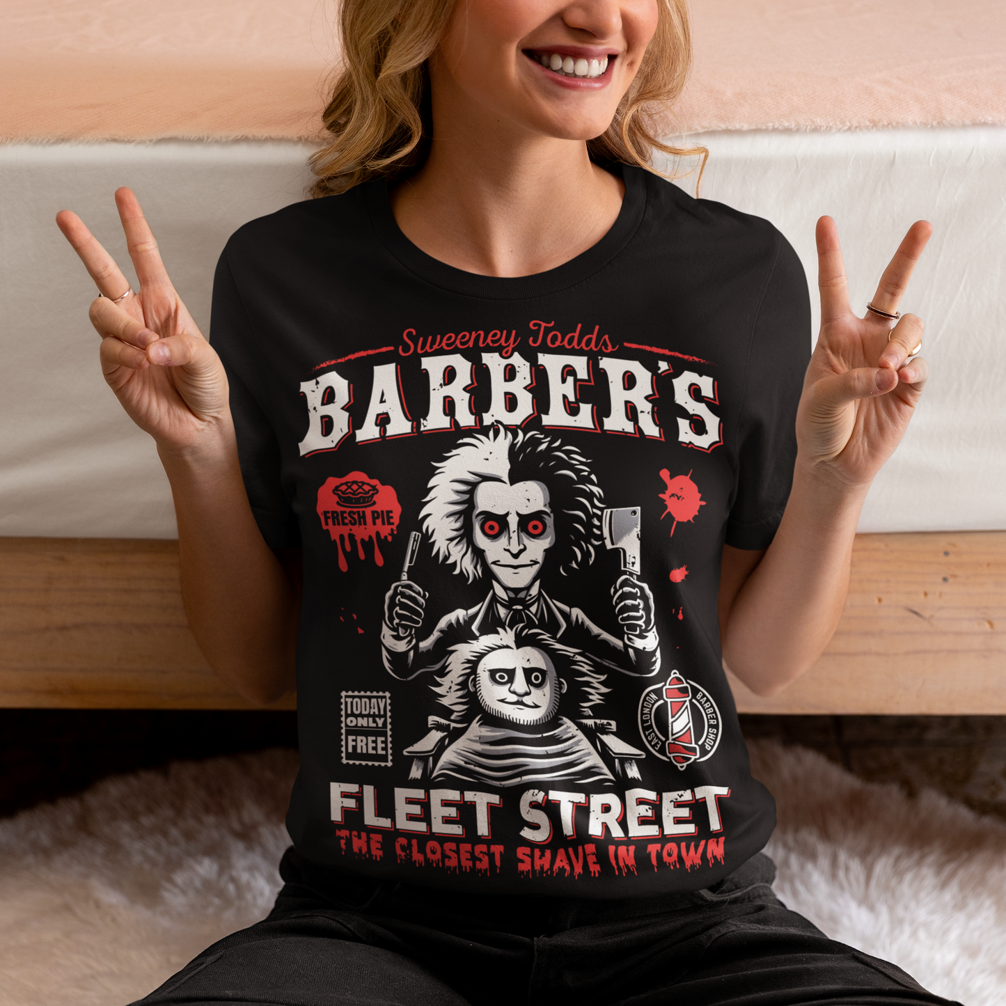 This bold shirt pays tribute to Sweeney Todd’s Barber Shop, the infamous haunt of Fleet Street. The shirt captures the eerie charm of the Demon Barber himself. Perfect for theatre fans, horror enthusiasts, or anyone with a taste for the macabre, this shirt is equal parts stylish and sinister.