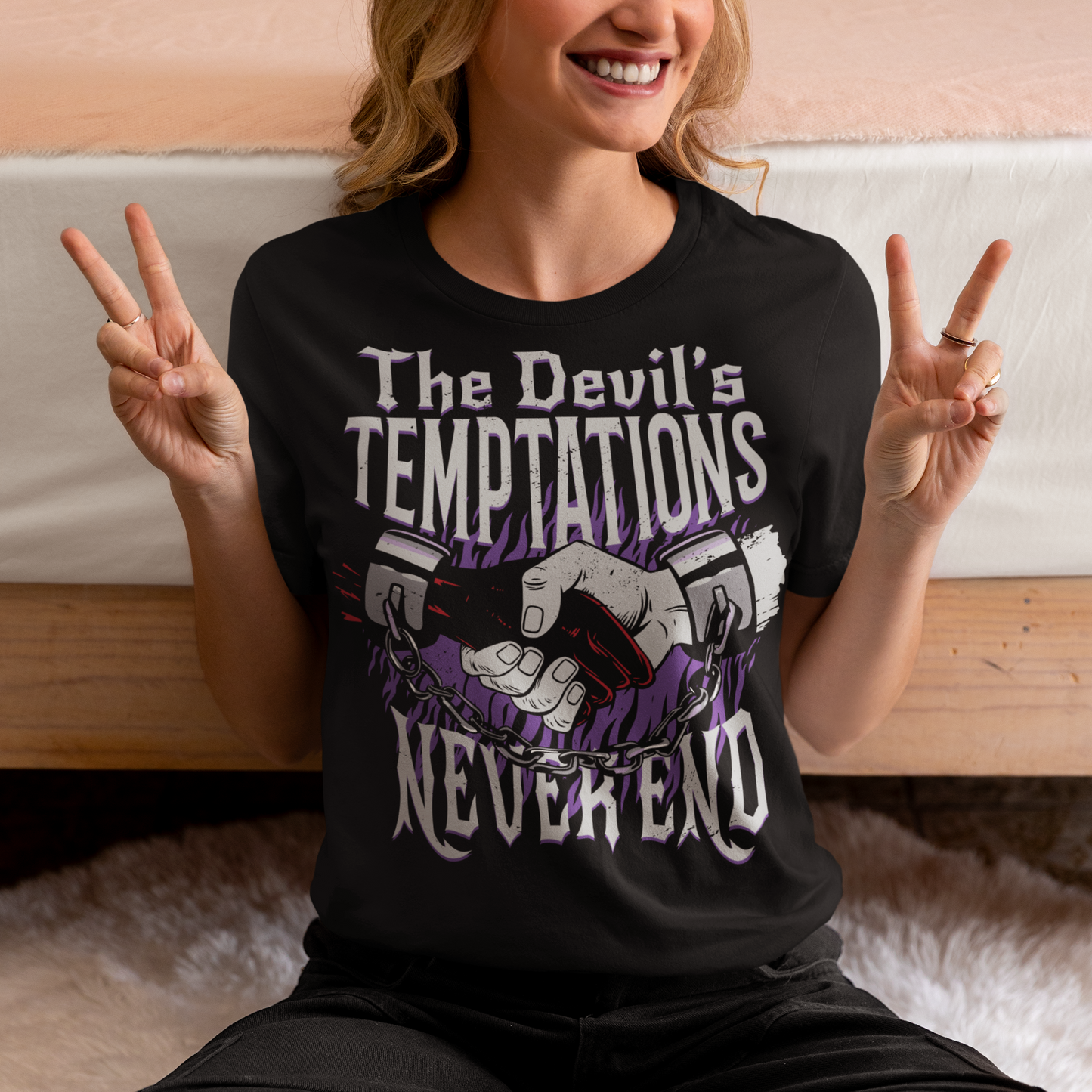 Introducing our captivating and thought-provoking t-shirt design, where symbolism and bold imagery converge to convey a powerful message. Embrace the allure of the mysterious with our "The Devil's Temptations Never End" t-shirt. At the center of this design, you'll find a mesmerizing illustration capturing a gripping moment between a hand and the Devil's hand.