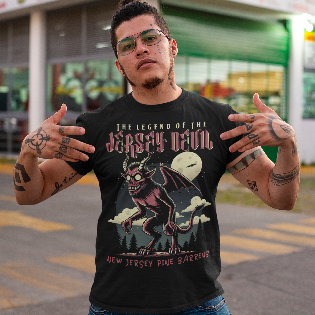 "Embrace the mystery with our Jersey Devil t-shirt! Featuring a striking depiction of the legendary creature , this shirt captures the intrigue and folklore of the New Jersey Pine Barrens. Above, bold letters declare 'THE LEGEND OF THE JERSEY DEVIL,' invoking tales of its enigmatic presence. Below, 'THE NEW JERSEY PINE BARRENS' grounds the design in the eerie beauty of its natural habitat. Wear it to ignite conversations and inspire curiosity about this enduring myth."