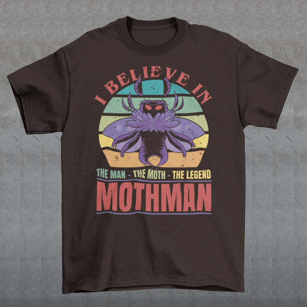 Introducing our legendary Mothman t-shirt, a must-have for believers and enthusiasts alike! Embrace the enigmatic allure of the Mothman phenomenon with this captivating design featuring the iconic cryptid against a retro sun background.