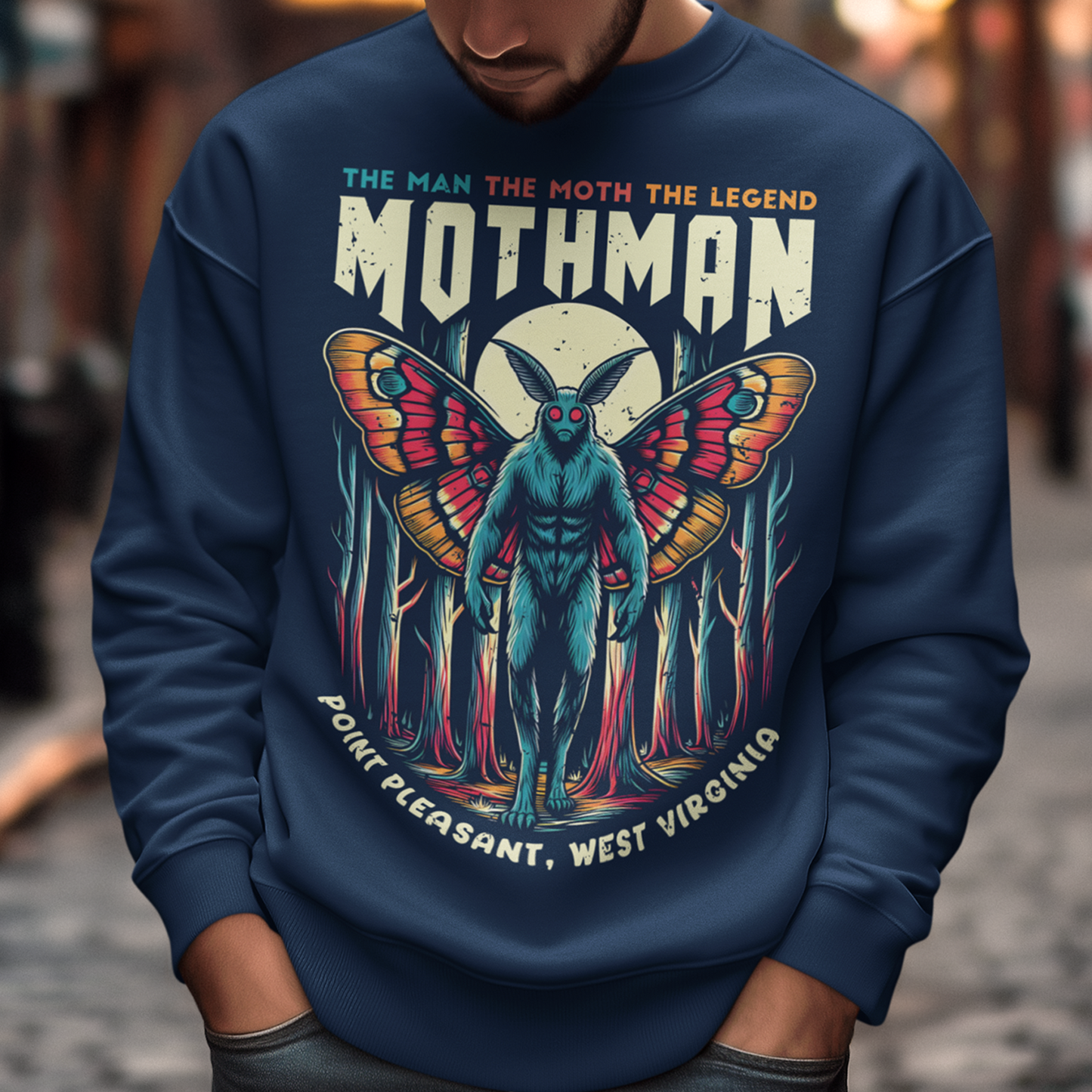 Introducing our exclusive Mothman sweatshirt, perfect for fans of cryptid lore and mysterious legends! This shirt features a striking design of the legendary Mothman lurking in a dense, moonlit forest. His glowing red eyes peer through the trees, capturing the eerie essence of the famed creature. Above the haunting image, bold text declares: "THE MAN THE MOTH THE LEGEND MOTHMAN," paying homage to the enigmatic figure who has intrigued generations.