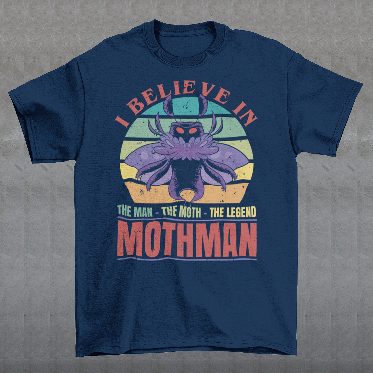 Introducing our legendary Mothman t-shirt, a must-have for believers and enthusiasts alike! Embrace the enigmatic allure of the Mothman phenomenon with this captivating design featuring the iconic cryptid against a retro sun background.