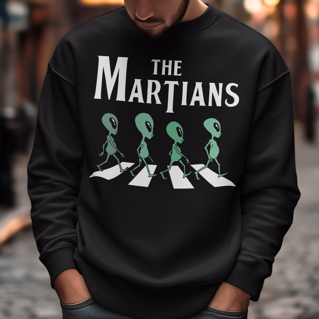 "Step into the extraterrestrial realm with our exclusive 'THE MARTIANS' shirt. This eye-catching design showcases four uniquely crafted aliens confidently crossing a road, adding a touch of whimsy and intrigue to your style. Printed with vibrant colors and intricate details, this shirt sparks curiosity about what lies beyond our planet. Embrace a blend of cosmic charm and playful imagination with 'THE MARTIANS' tee, inviting conversation and celebrating the mysteries of the universe in style."
