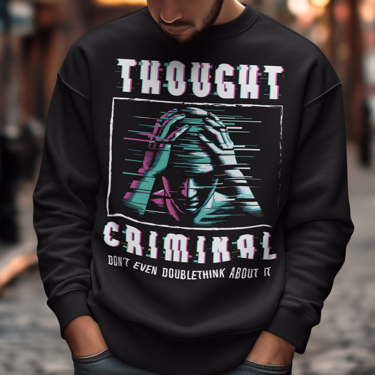 This bold and edgy Sweatshirt features the phrase "THOUGHT CRIMINAL" in a glitched, distorted font, giving it a rebellious, cyberpunk-inspired aesthetic. The design evokes themes of censorship, free thought, and dystopian resistance, making it perfect for those who challenge the status quo. Whether you're a fan of cyberpunk, retro-futurism, or just love thought-provoking designs, this tee is sure to turn heads.