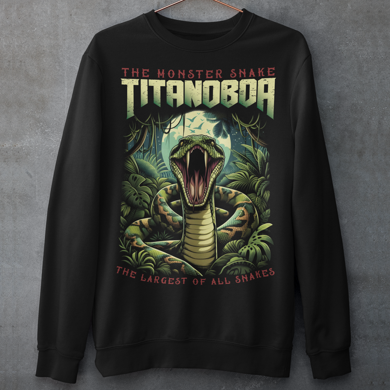 Unleash your wild side with our exclusive Titanoboa sweatshirt, featuring a striking and lifelike illustration of a boa constrictor in all its majestic glory. The detailed artwork captures the essence of this ancient, colossal serpent, with scales so realistic you can almost feel them. Above the formidable snake, bold and powerful text reads "THE MONSTER SNAKE TITANOBOA," making a clear statement that commands attention. Perfect for snake enthusiasts.