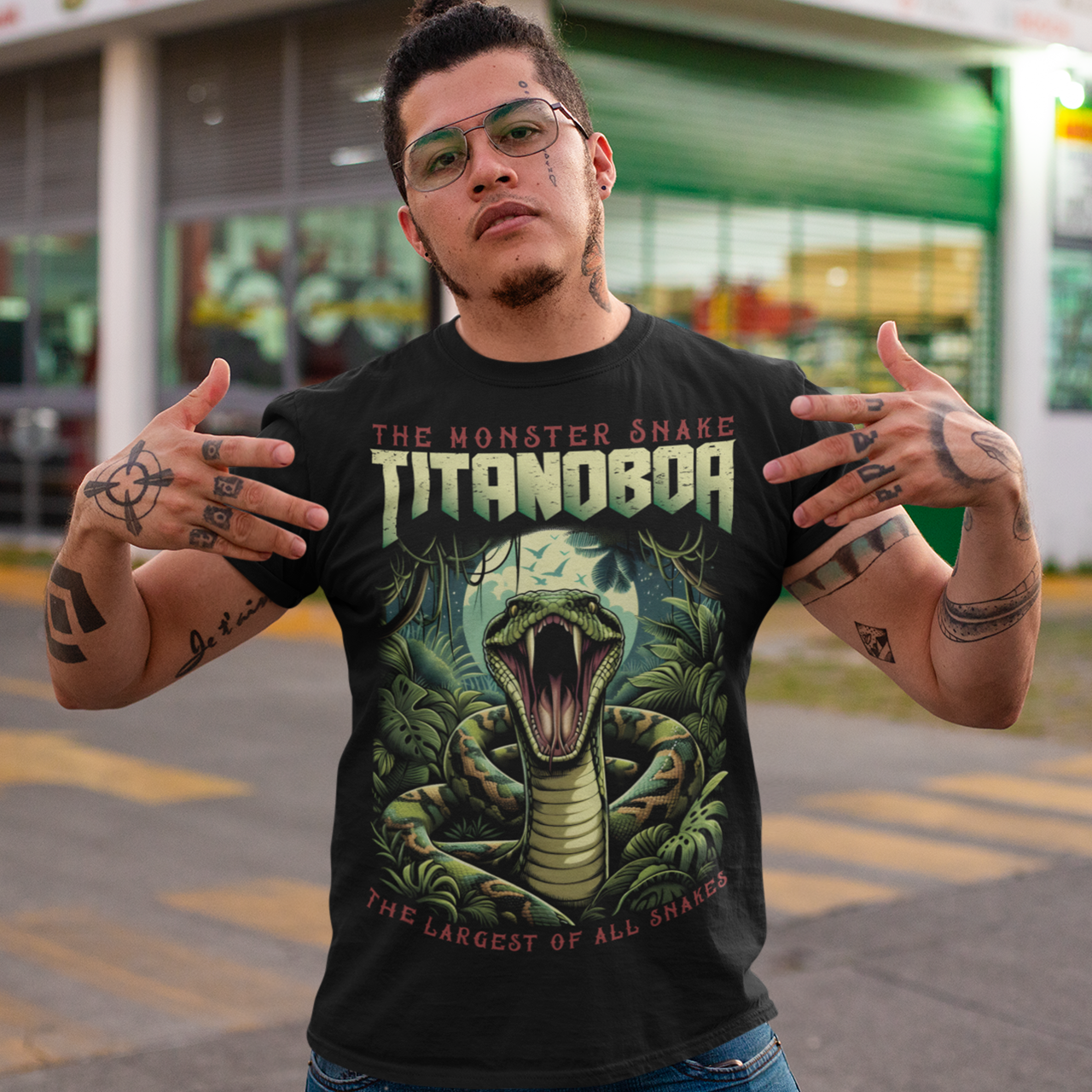 Unleash your wild side with our exclusive Titanoboa t-shirt, featuring a striking and lifelike illustration of a boa constrictor in all its majestic glory. The detailed artwork captures the essence of this ancient, colossal serpent, with scales so realistic you can almost feel them. Above the formidable snake, bold and powerful text reads "THE MONSTER SNAKE TITANOBOA," making a clear statement that commands attention. Perfect for snake enthusiasts