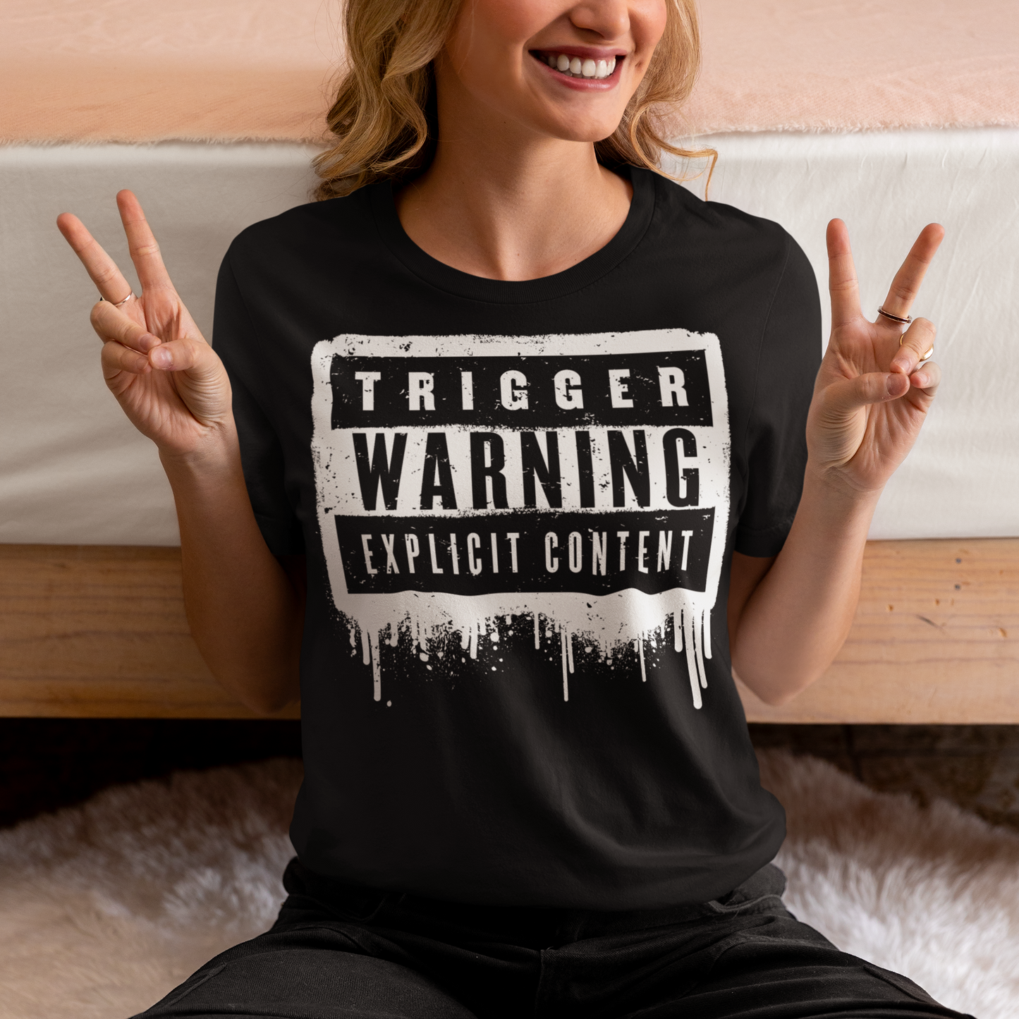 This t-shirt features a bold paint design with the words "Trigger Warning" and "Explicit Content". The message is clear and direct, warning others that the content may be disturbing or offensive.