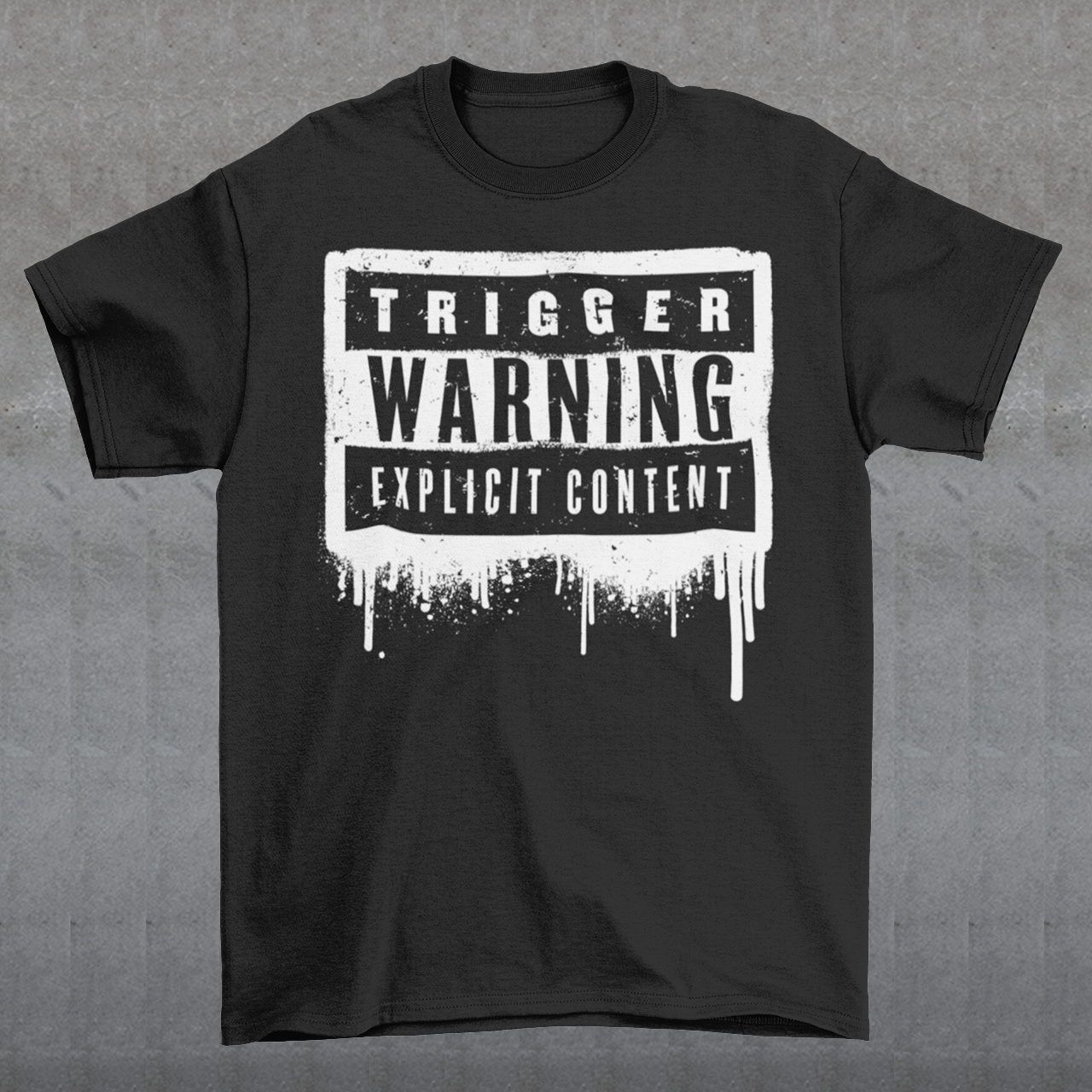 This t-shirt features a bold paint design with the words "Trigger Warning" and "Explicit Content". The message is clear and direct, warning others that the content may be disturbing or offensive.