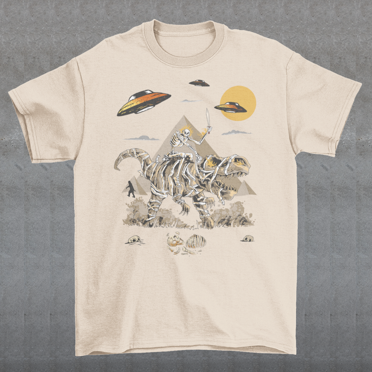 Get ready to embark on an epic adventure with our mind-blowing t-shirt design! Picture this: a skeleton riding a T-Rex through the ancient wonders of Egypt, with UFOs hovering in the sky and Bigfoot mysteriously lurking in the background. It's a jaw-dropping fusion of history, mythology, and the unknown, all beautifully captured in one captivating design.