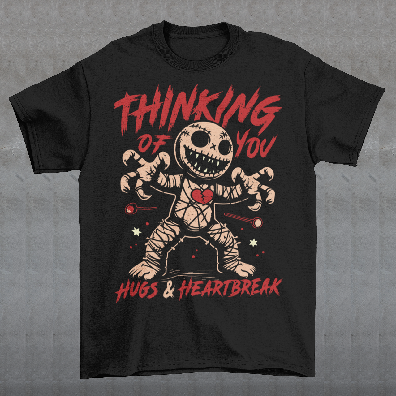 Dark humor meets twisted sweetness with this bold tee. Featuring a stitched-up voodoo doll at the center, the design captures that perfect mix of love and pain. Above the doll, the phrase “THINKING OF YOU” adds a playful sting, while below, “HUGS & HEARTBREAK” ties it all together with equal parts irony and affection. Perfect for anyone who loves edgy, alternative fashion—or just wants to send a cheeky message without saying a word.