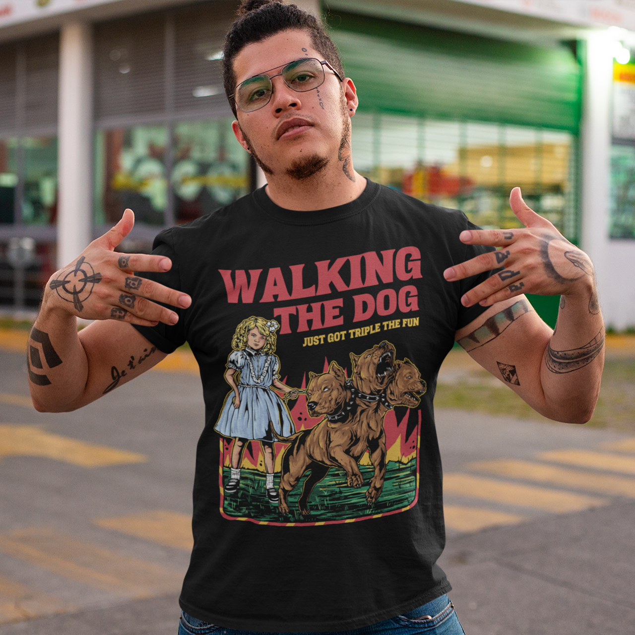 Introducing our newest t-shirt for all the daring dog walkers out there! If you're brave enough to take on the underworld's fiercest hound, Cerberus, then this shirt is for you. With a bold print of a girl confidently strolling alongside the three-headed beast, our "WALKING THE DOG JUST GOT TRIPLE THE FUN" tee is perfect for anyone who likes to add a bit of excitement to their daily routine.