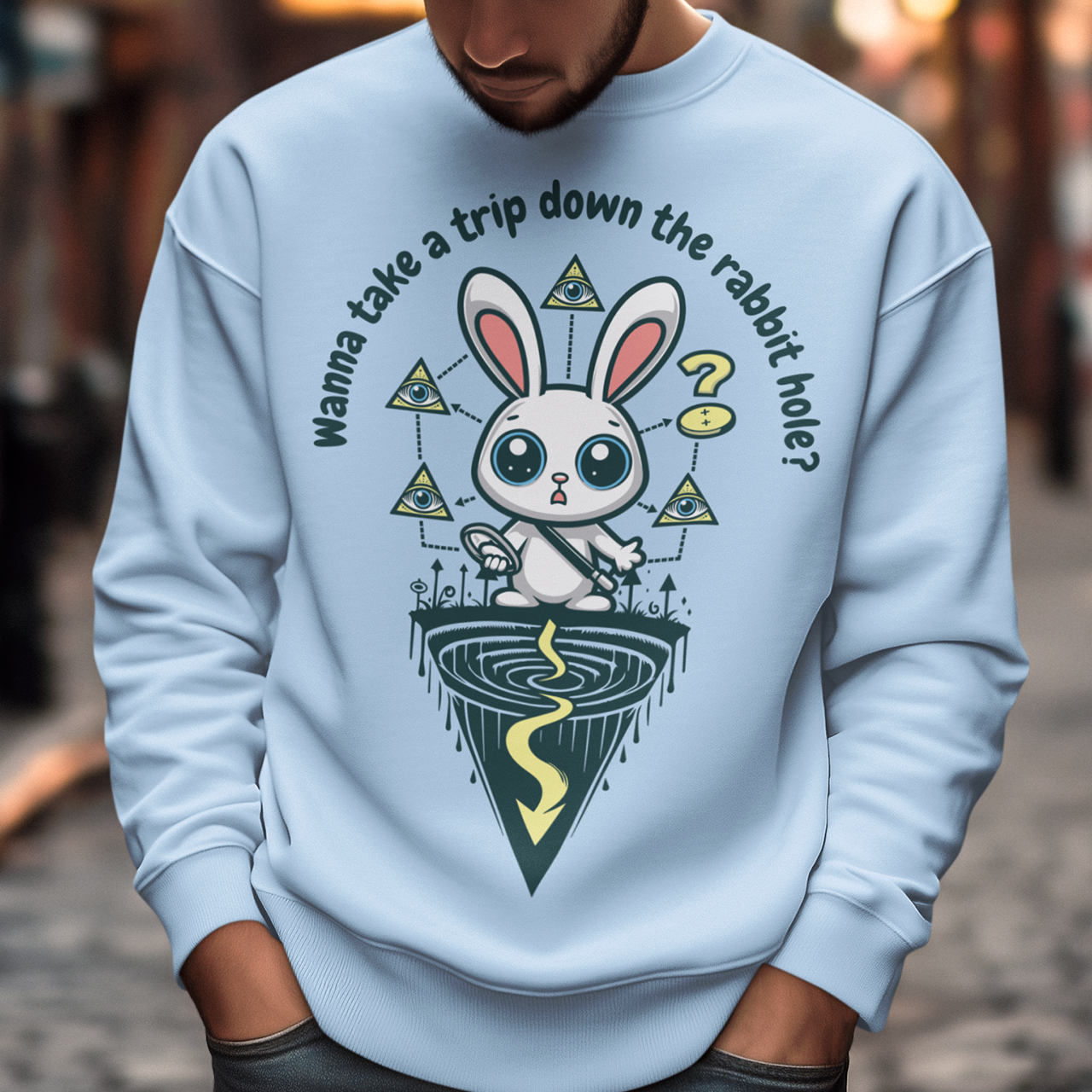 Introducing our one-of-a-kind sweatshirt design that's sure to turn heads and spark conversations wherever you go! Picture this: a mysterious rabbit, with an enigmatic glint in its eye, standing poised at the entrance of a deep rabbit hole. Its ears perked up, as if listening for secrets only it knows. Above this captivating scene, bold text reads: "WANNA TAKE A TRIP DOWN THE RABBIT HOLE." Embrace your inner conspiracy theorist and invite others to join you on a journey into the unknown.