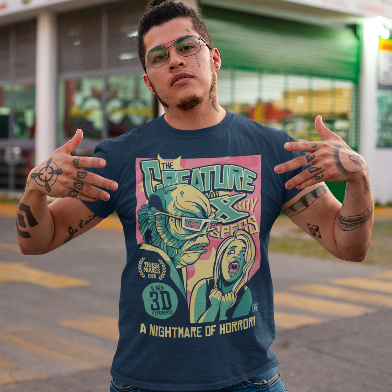 Unleash the monster within with this bold and striking Creature from the Black Lagoon comic book design. Featuring the iconic creature emerging from the depths of the murky lagoon, this t-shirt is a must-have for any fan of classic horror movies and graphic novels. The comic book artwork captures every terrifying detail of the creature's scaly skin and piercing eyes, making it a truly spine-chilling addition to your wardrobe.