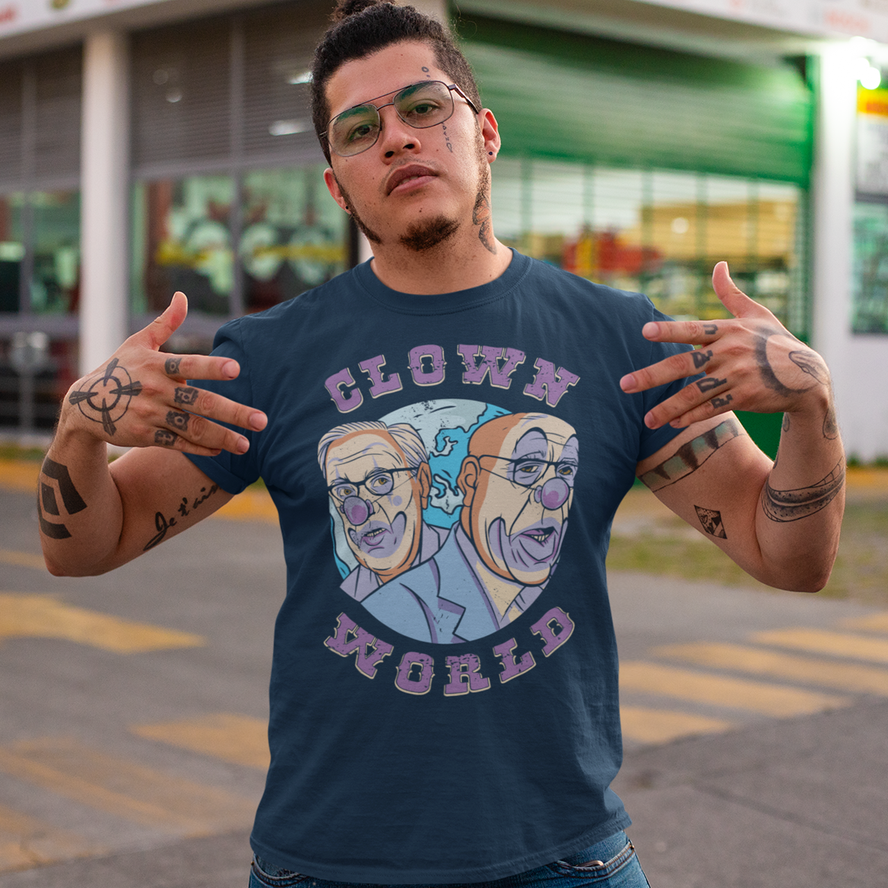 This bold and colorful t-shirt features a playful design that captures the absurdity and chaos of our modern times. With a cast of wacky characters, including clowns, jesters, and other oddball creatures, this shirt is perfect for anyone who loves a good laugh or wants to show their disdain for the status quo.
