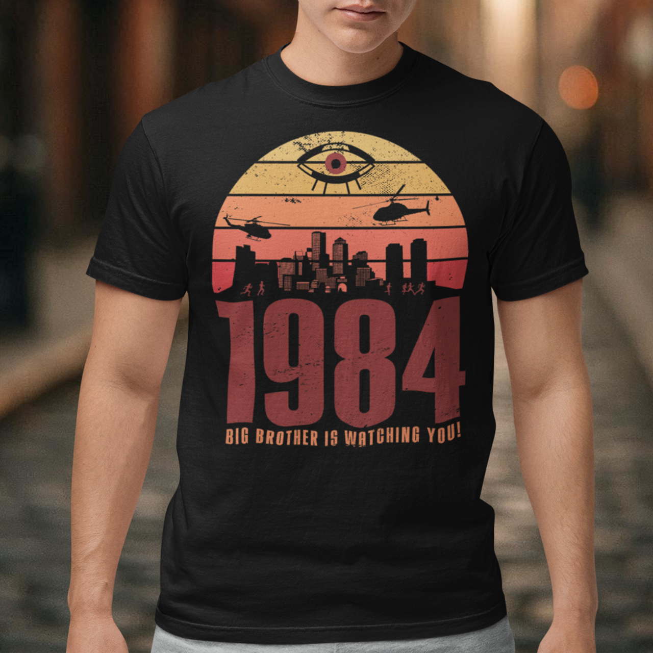 Introducing our George Orwell 1984 t-shirt with a bold "Big Brother is Watching" design! If you're a fan of Orwell's classic dystopian novel or just love thought-provoking literary references, this shirt is for you. The design features the iconic phrase "Big Brother is Watching" in small, bold letters, set against a stark sunset background. The lettering has a slightly distressed, vintage look, giving the shirt a cool, edgy vibe.
