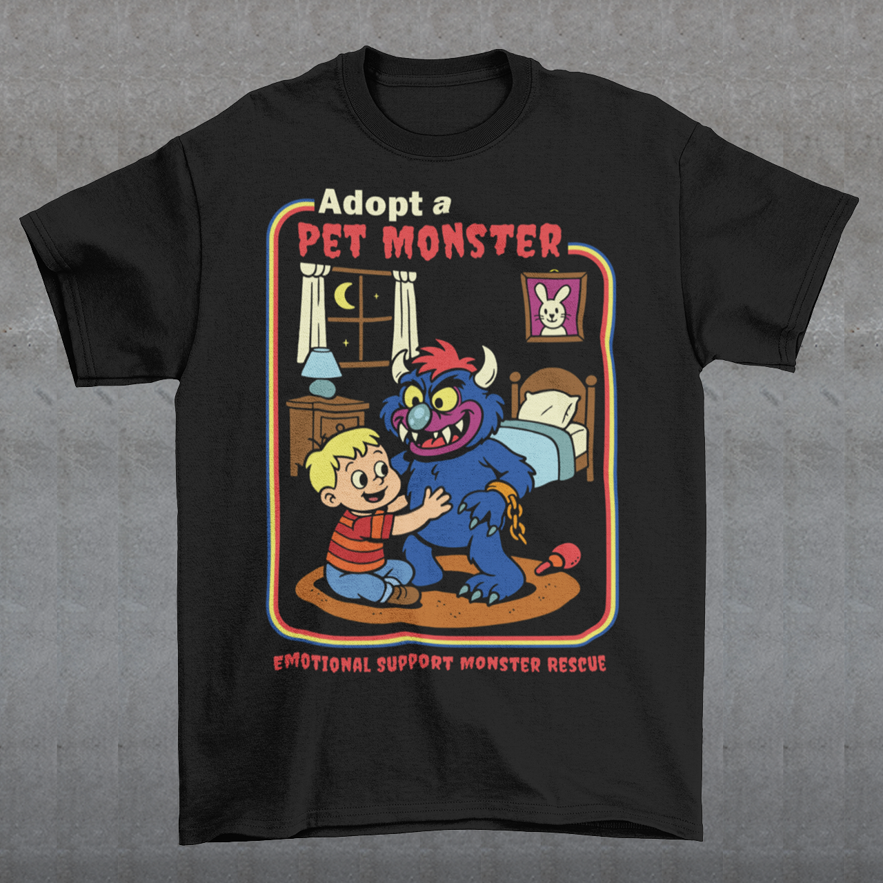 My pet monster t-shirt. Soft, spooky, and suspiciously adorable, this tee looks like it came straight from a slightly haunted Saturday morning cartoon vault. The design features a wide eyed kid befriending a fuzzy little monster with tiny horns and big attitude, all set inside a cozy bedroom scene with retro storybook vibes. The bold “Adopt a Pet Monster” headline and “Emotional Support Monster Rescue” tagline sell the joke perfectly, blending cute chaos with feel good humor.