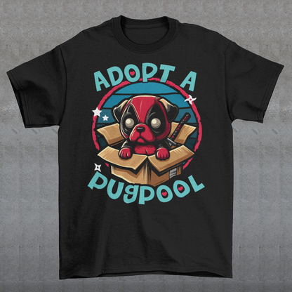 The T-shirt design features an adorable pug dressed as a mercenary, complete with a tiny red and black costume and a mask, sitting comfortably inside a slightly worn cardboard box. Around the design says "ADOPT A PUGPOOL" in a playful, hand-drawn font, giving it a quirky, homemade look.
