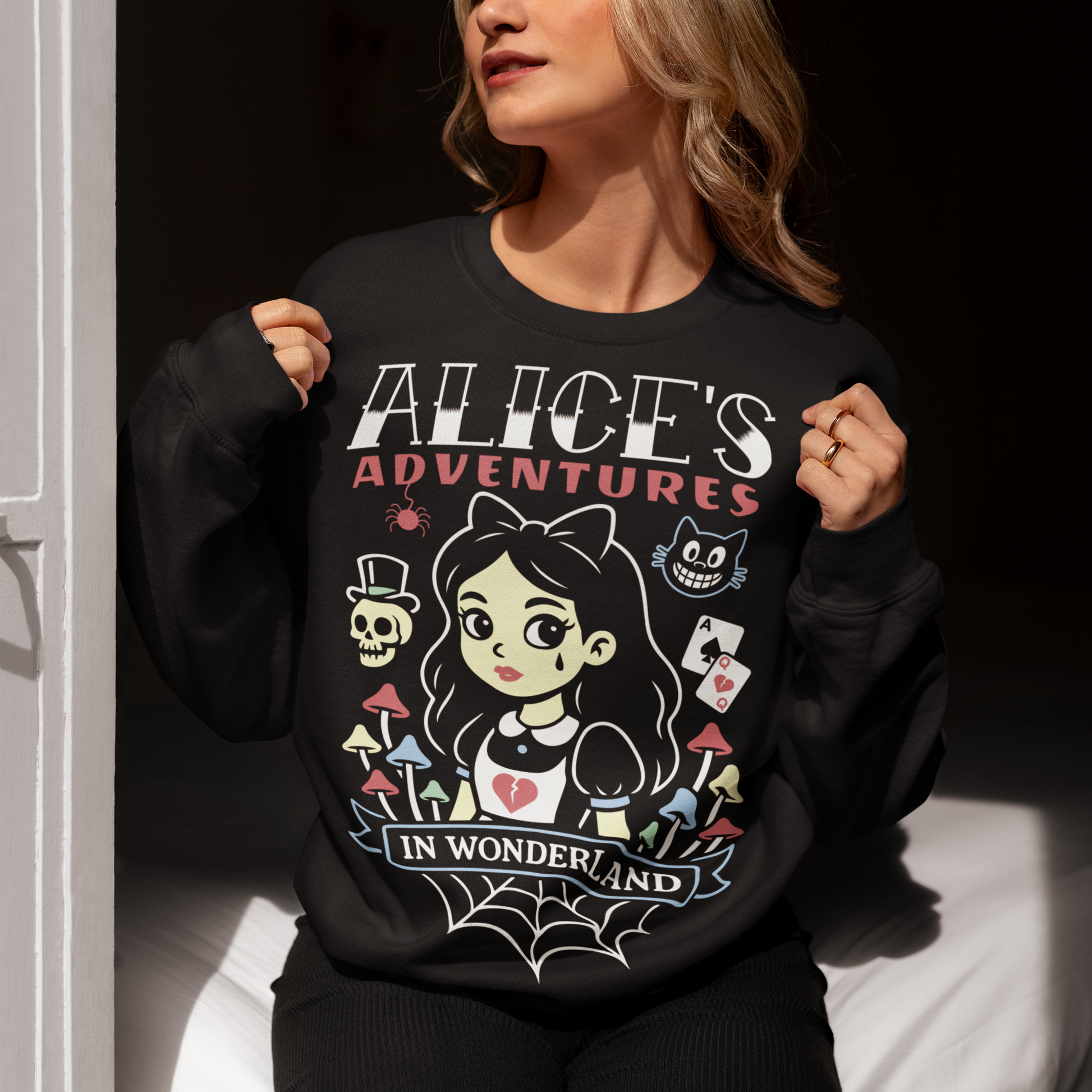 Step into a twisted dreamscape with our “Alice’s Adventures in Wonderland” sweatshirt — a dark and whimsical take on the classic tale. Featuring a bold gothic design of Alice surrounded by eerie mushrooms, a grinning cat, and haunting details, this cozy shirt blends creepy-cute vibes with vintage fantasy style. Perfect for fans of dark art, gothic fashion, and Wonderland-inspired horror, this shirt makes a statement wherever you go.