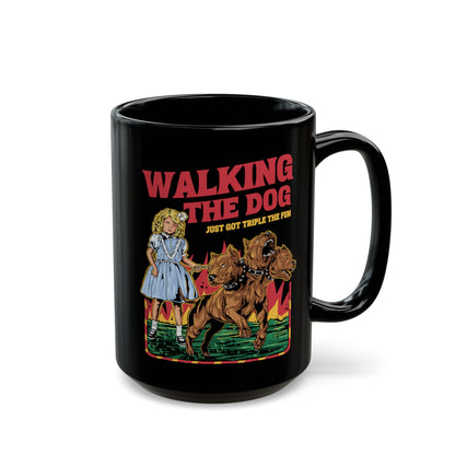 Black mug of a girl taking Cerberus dog for a walk with text WALKING THE DOG JUST GOT TRIPLE THE FUN.