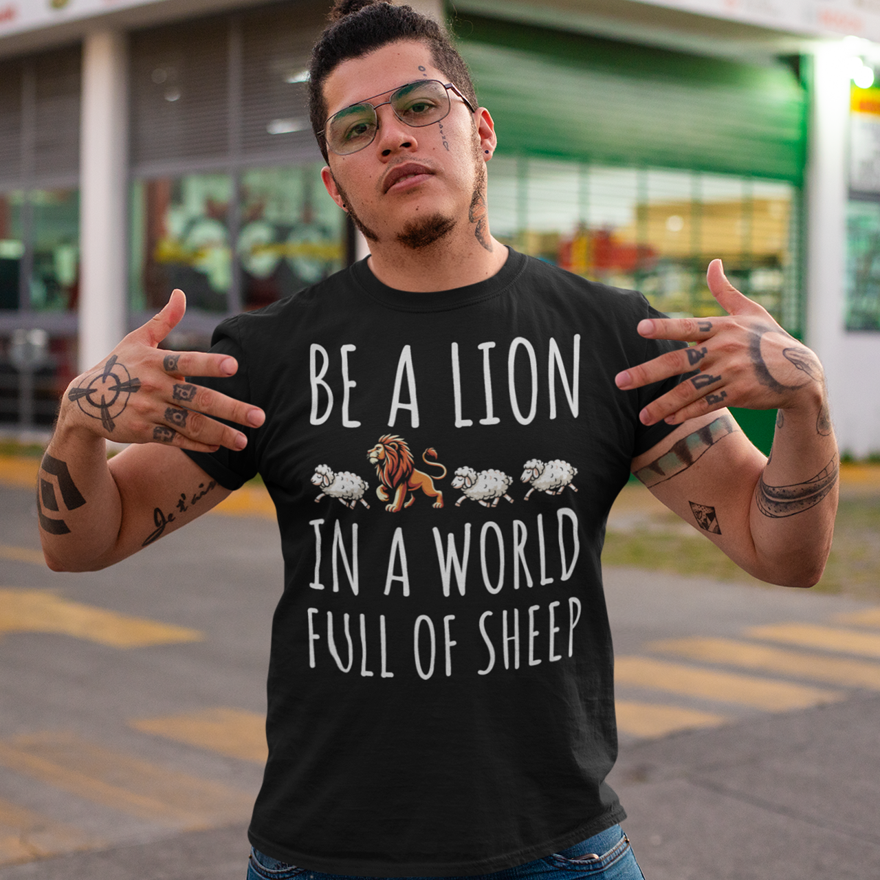 Unleash your inner strength and stand out from the crowd with our bold and inspiring t-shirt. Featuring a powerful graphic of a majestic lion confidently leading three sheep, this design embodies courage and individuality. The striking text "BE A LION IN A WORLD FULL OF SHEEP" serves as a motivational mantra, encouraging you to embrace your uniqueness and lead with confidence.