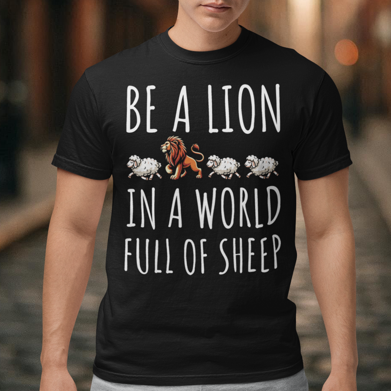 Unleash your inner strength and stand out from the crowd with our bold and inspiring t-shirt. Featuring a powerful graphic of a majestic lion confidently leading three sheep, this design embodies courage and individuality. The striking text "BE A LION IN A WORLD FULL OF SHEEP" serves as a motivational mantra, encouraging you to embrace your uniqueness and lead with confidence.