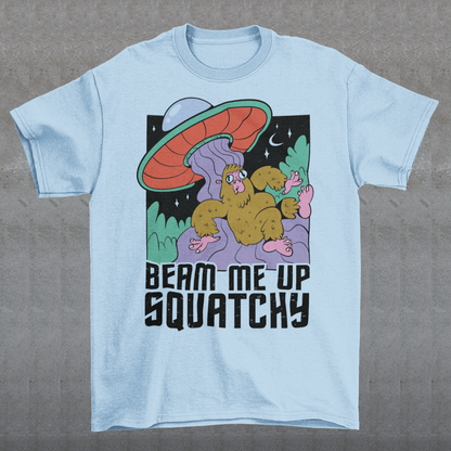 Introducing the extraterrestrial enigma that'll spark conversations and laughter wherever you go – the "BEAM ME UP SQUATCHY" t-shirt. This whimsical masterpiece seamlessly blends the worlds of cryptozoology and outer space, leaving a trail of intrigue and smiles in its wake. Set against a backdrop of midnight sky, this t-shirt showcases a captivating scene that defies conventional explanation.