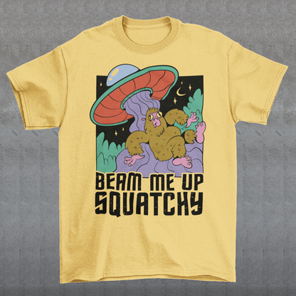 Introducing the extraterrestrial enigma that'll spark conversations and laughter wherever you go – the "BEAM ME UP SQUATCHY" t-shirt. This whimsical masterpiece seamlessly blends the worlds of cryptozoology and outer space, leaving a trail of intrigue and smiles in its wake. Set against a backdrop of midnight sky, this t-shirt showcases a captivating scene that defies conventional explanation.