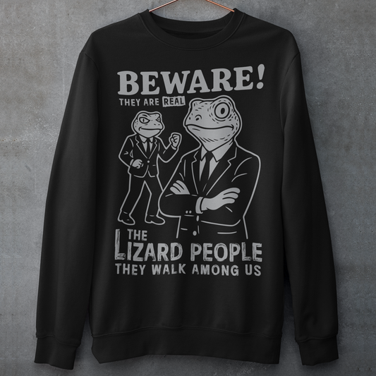 This “Beware! Lizard People” sweatshirt turns a classic conspiracy wink into wearable humor. The suited-up reptilian characters strike a bold, comic-book stance that adds a playful sense of intrigue to your outfit. Crisp line art and a vintage poster feel make it a standout for sci-fi lovers, meme collectors, and anyone who enjoys a touch of tongue-in-cheek absurdity. It’s the perfect shirt for sparking conversations and raising eyebrows in all the right ways.