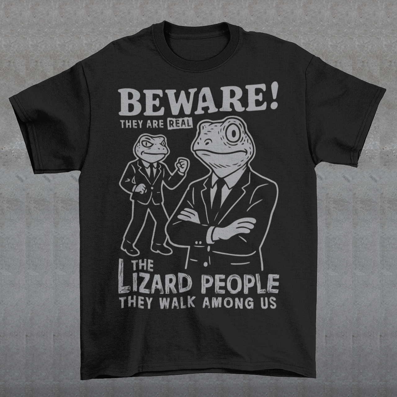 This “Beware! Lizard People” tee turns a classic conspiracy wink into wearable humor. The suited-up reptilian characters strike a bold, comic-book stance that adds a playful sense of intrigue to your outfit. Crisp line art and a vintage poster feel make it a standout for sci-fi lovers, meme collectors, and anyone who enjoys a touch of tongue-in-cheek absurdity. It’s the perfect shirt for sparking conversations and raising eyebrows in all the right ways.