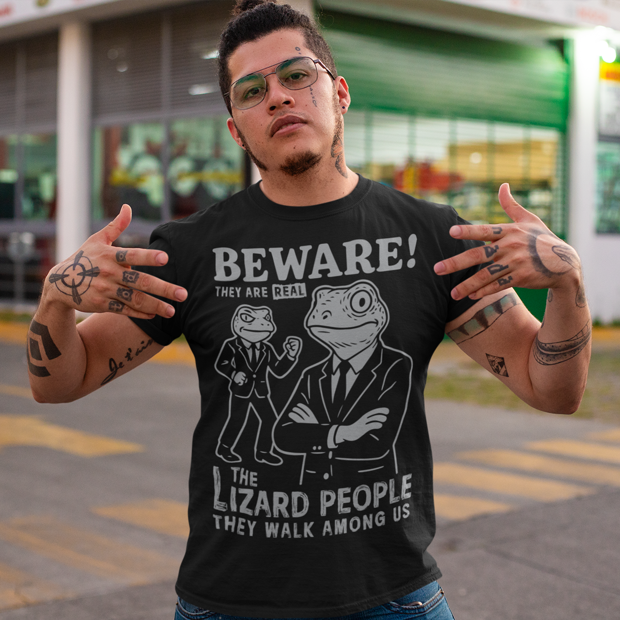 This “Beware! Lizard People” tee turns a classic conspiracy wink into wearable humor. The suited-up reptilian characters strike a bold, comic-book stance that adds a playful sense of intrigue to your outfit. Crisp line art and a vintage poster feel make it a standout for sci-fi lovers, meme collectors, and anyone who enjoys a touch of tongue-in-cheek absurdity. It’s the perfect shirt for sparking conversations and raising eyebrows in all the right ways.